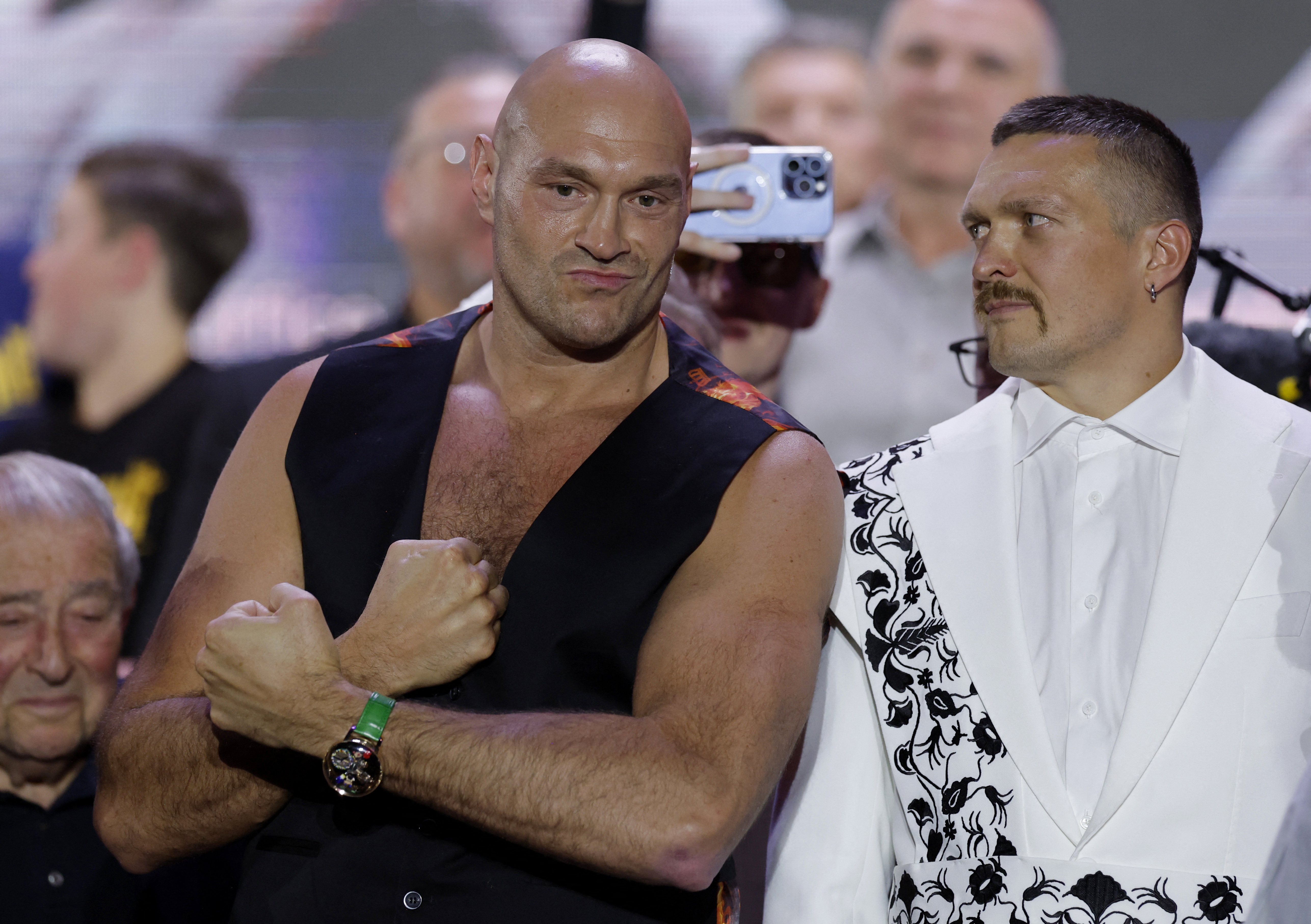 Boxer poses at media conference.