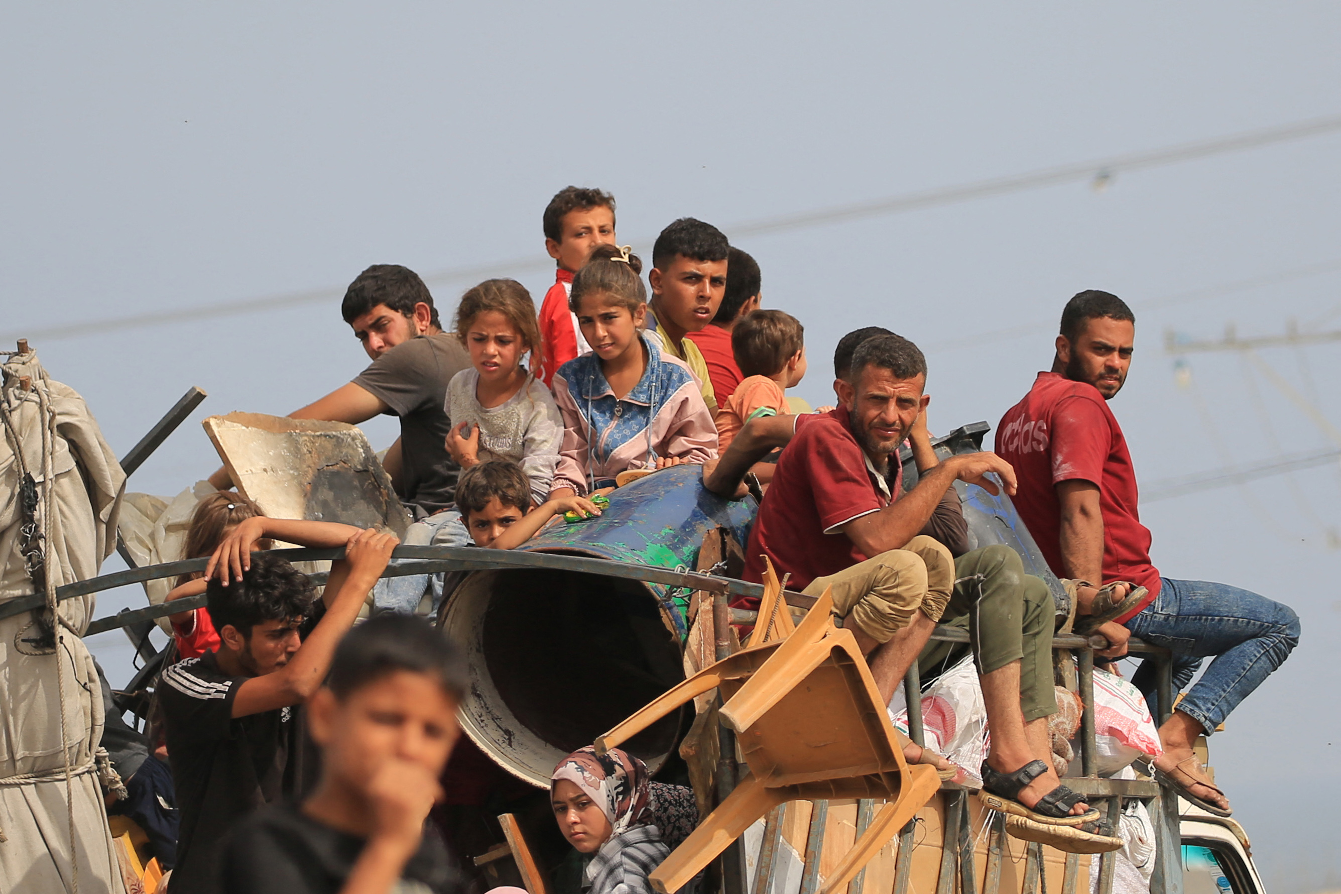 Palestinians flee Tal as-Sultan in Rafah in southern Gaza after renewed Israeli strikes on the city on May 28, 2024