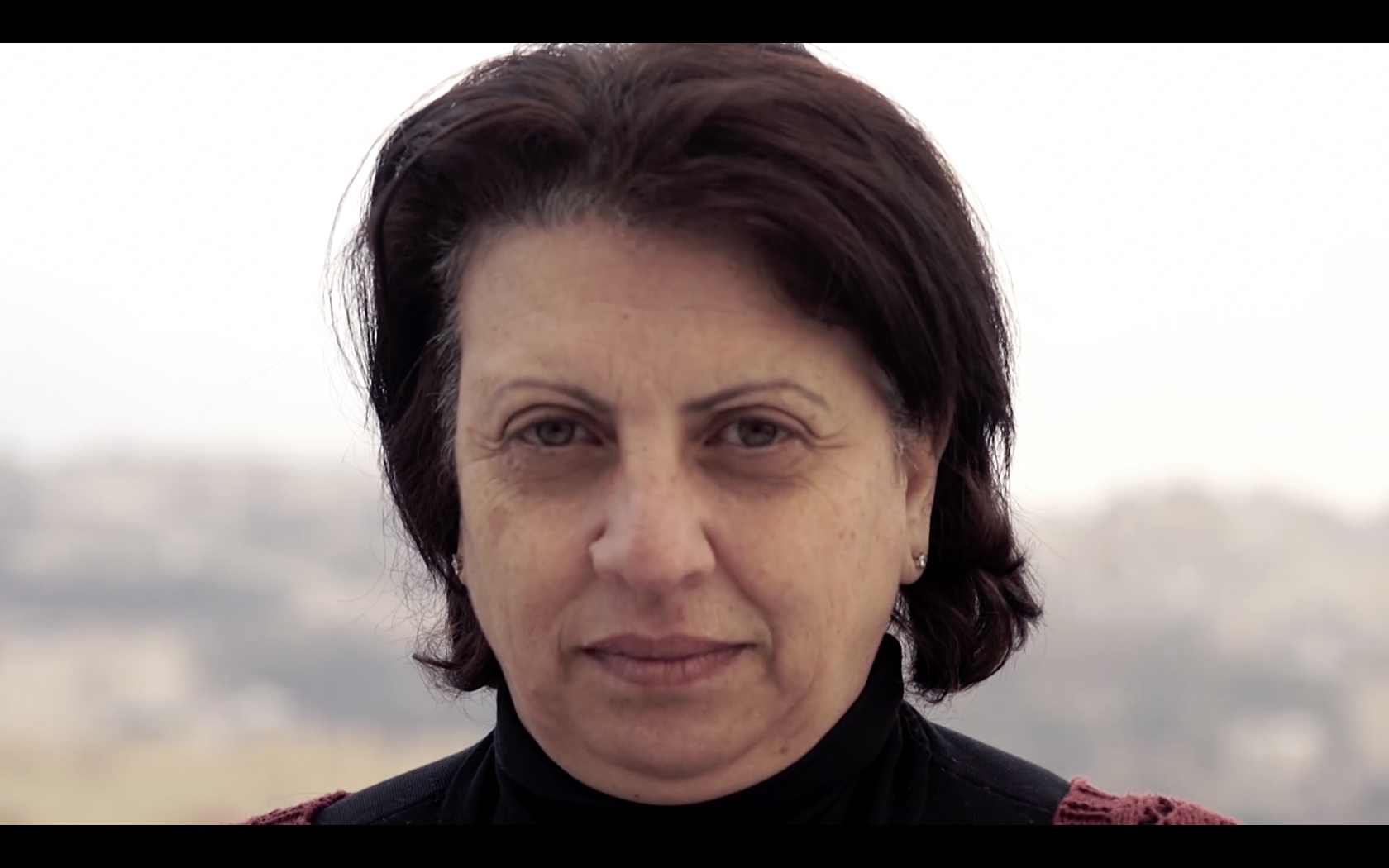 Palestinian Christian Muna Tannous shares her perspective on the conflict in The Tinderbox [Courtesy of Gillian Mosely]