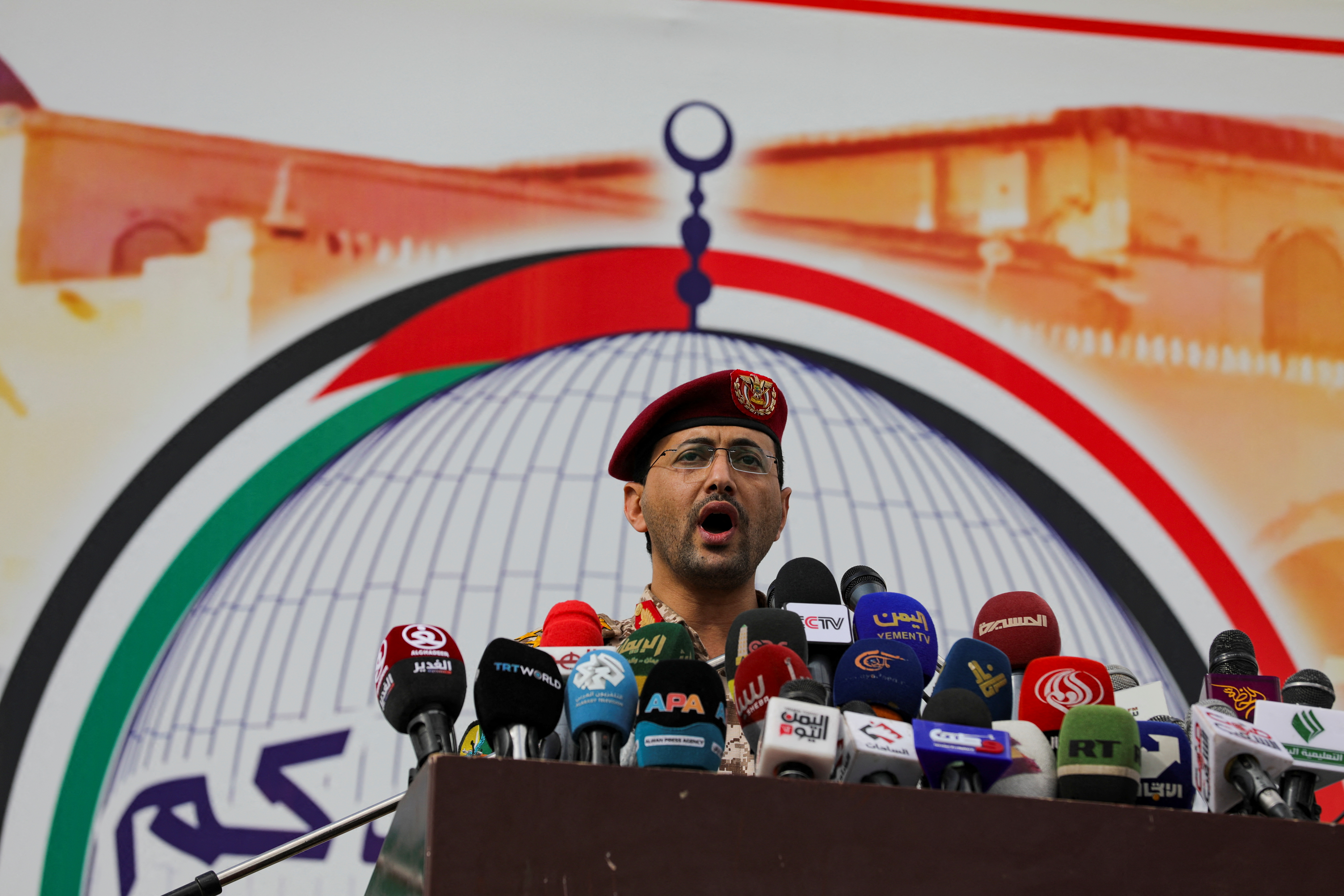 Houthi military spokesperson Yahya Sarea delivers a statement at a pro-Palestinian rally in Sanaa on March 15, 2024. The Yemeni group has conducted repeated attacks on ships it says are linked to Israel