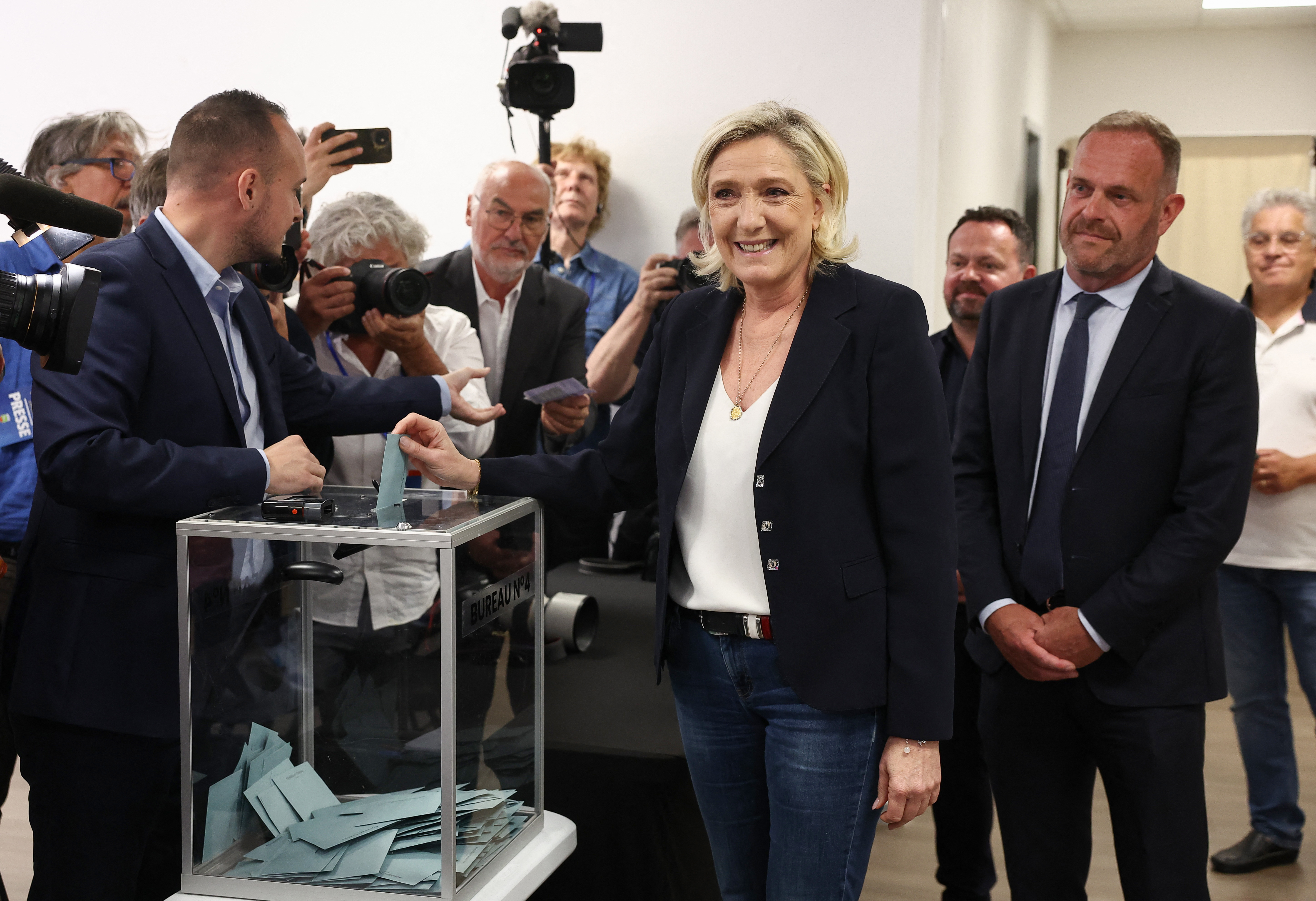 Marine Le Pen, French far-right leader of the National Rally party candidate, casts her ballot