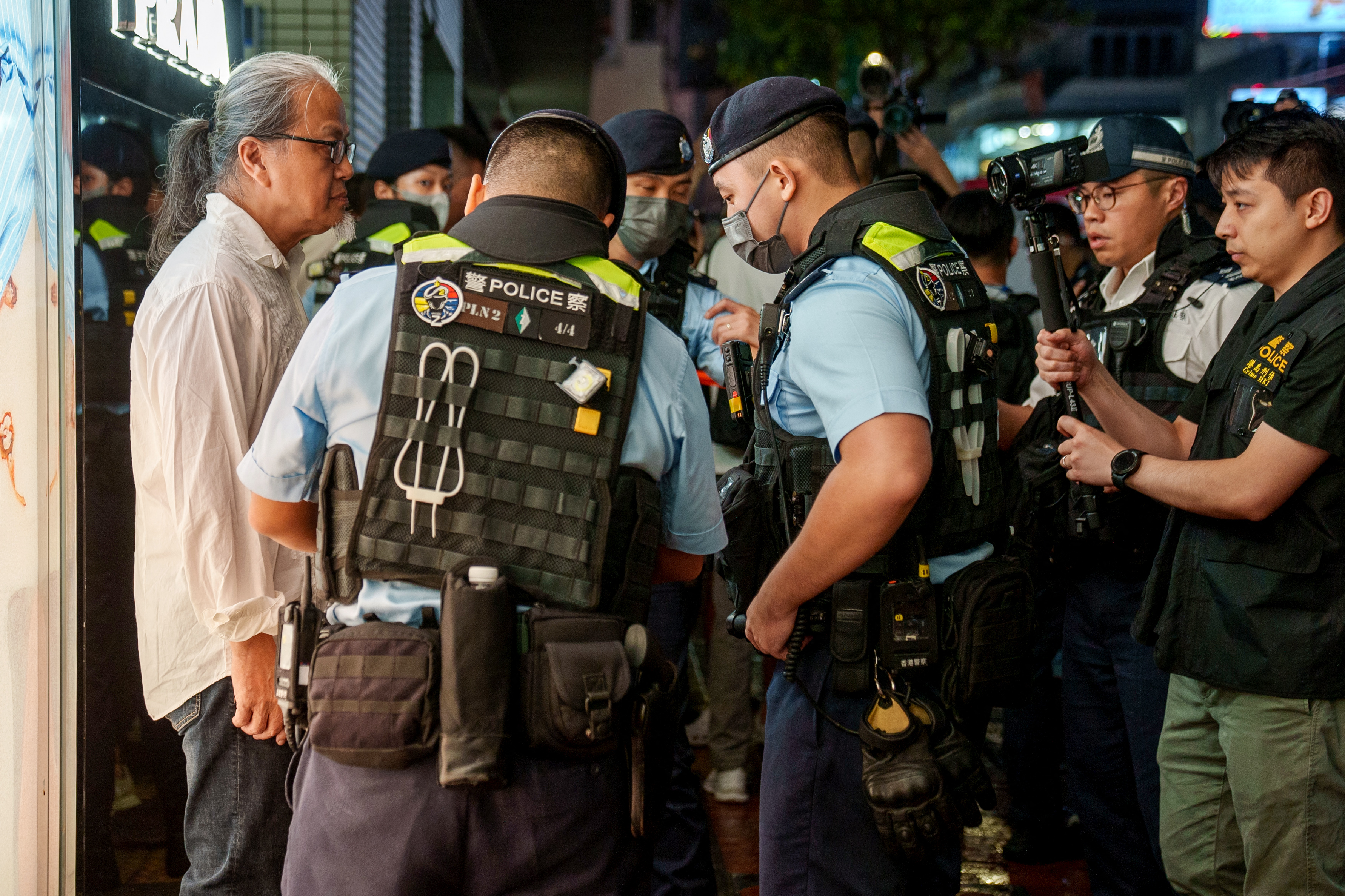 Hong Kong police searching performance artist Sanmu Chen