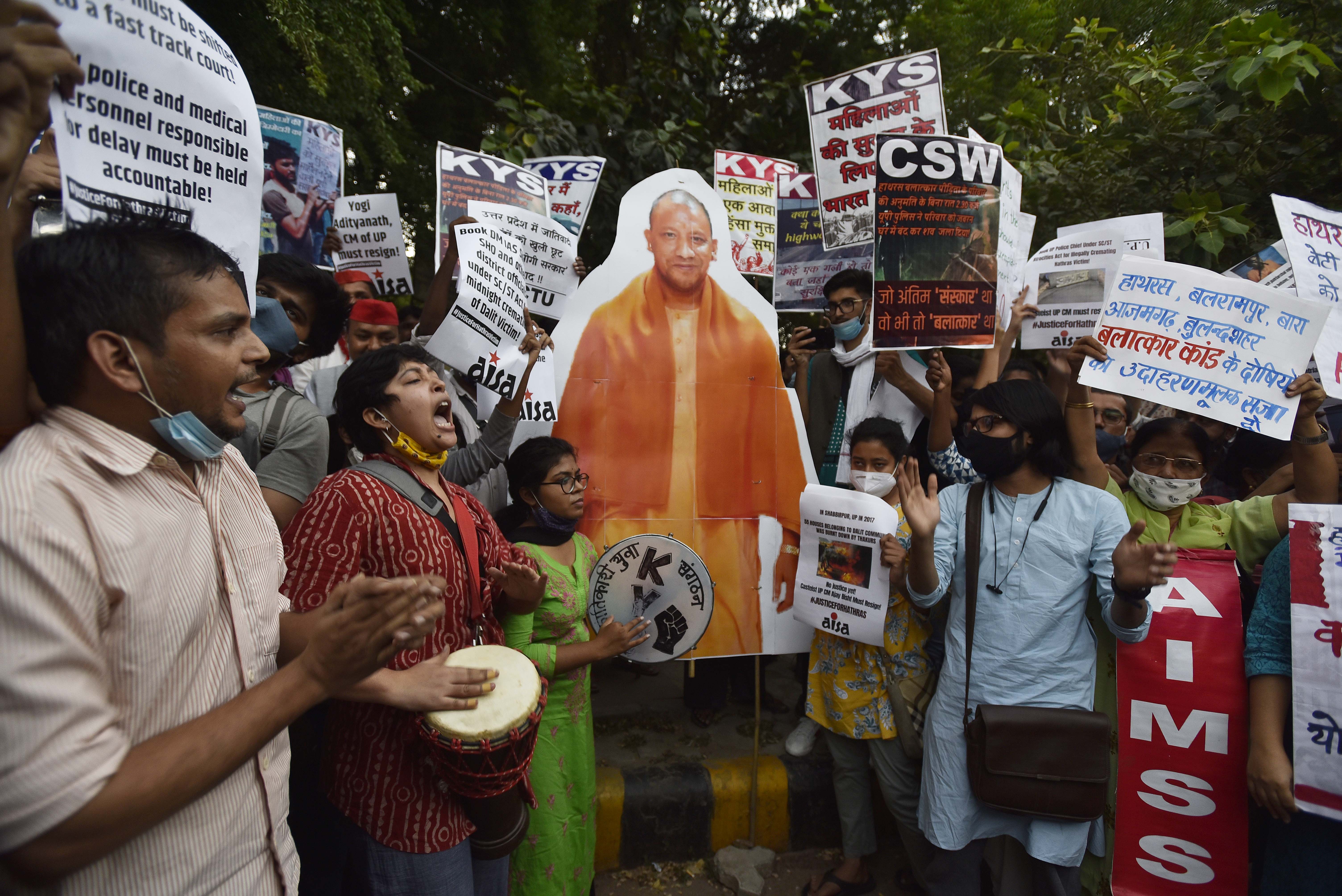 Demonstrators in New Delhi in 2020 protest against the gang rape of a Dalit woman, alongside other crimes against women. The demonstrators burned a cut-out of UP Chief Minister Adityanath in protest