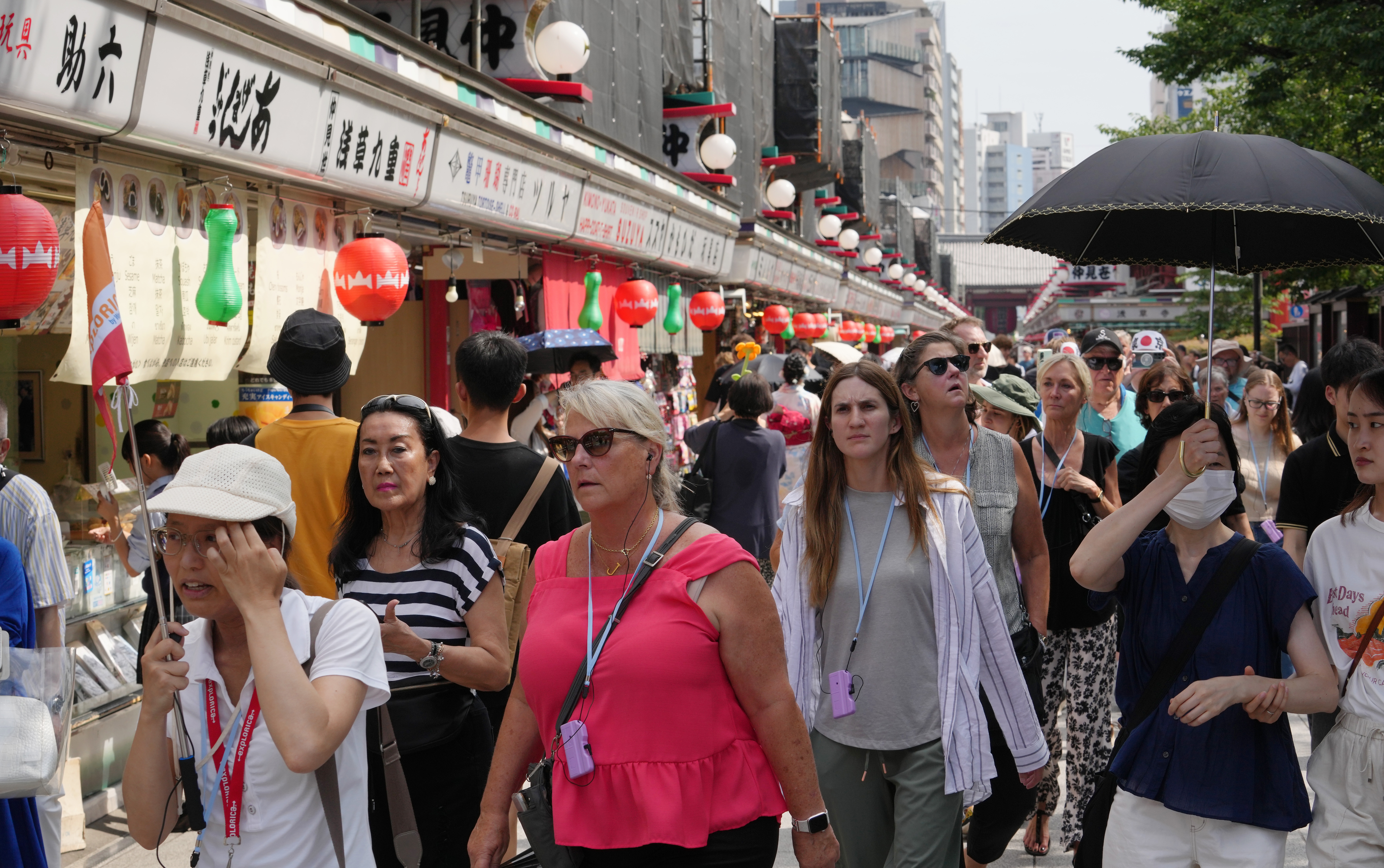 Foreign tourists visit Nakamise Street in the Asakusa district of Tokyo, Japan on July 17, 2024