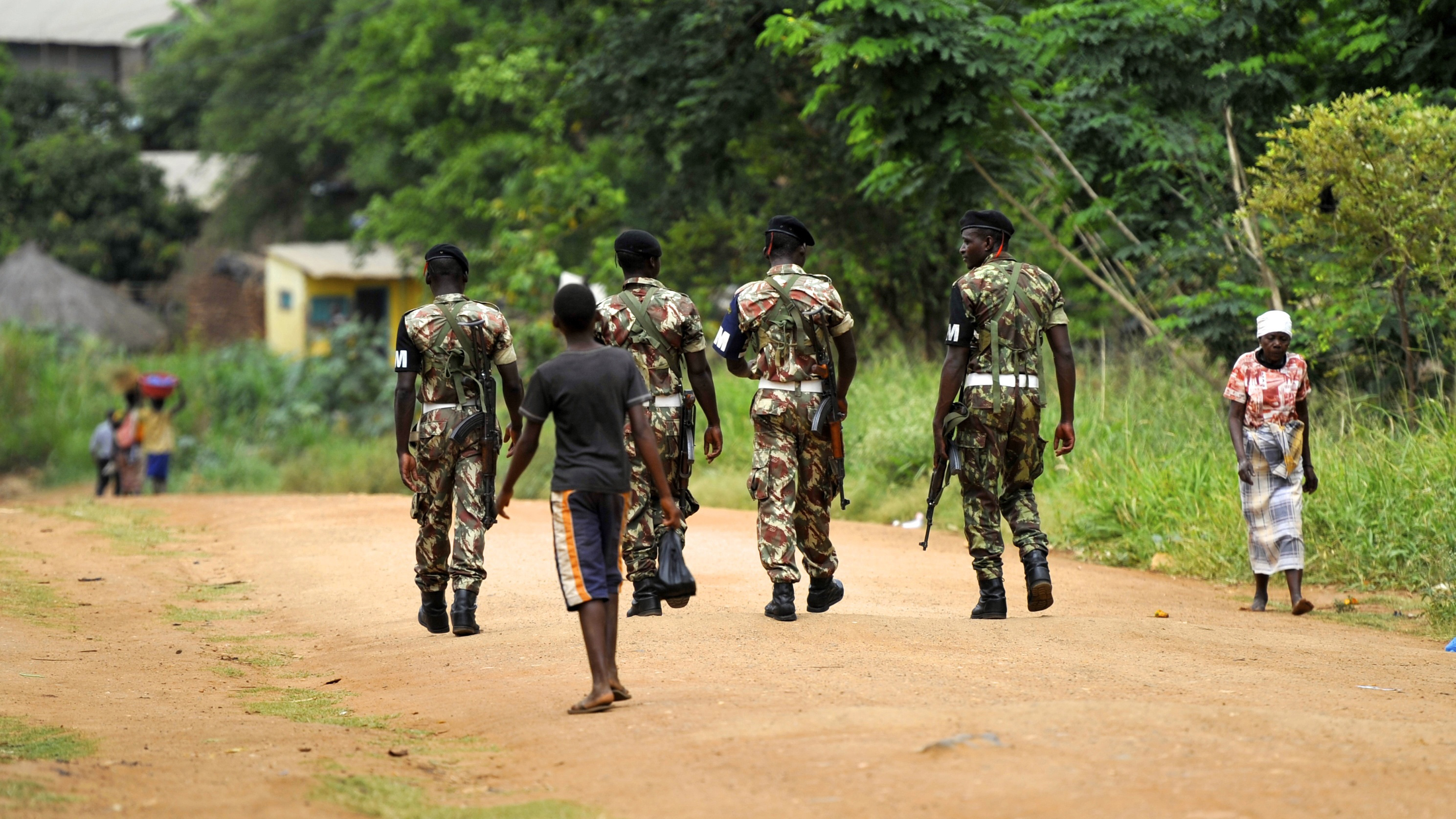 Government military police patrol the streets of Gorongosa Village in central Mozambique