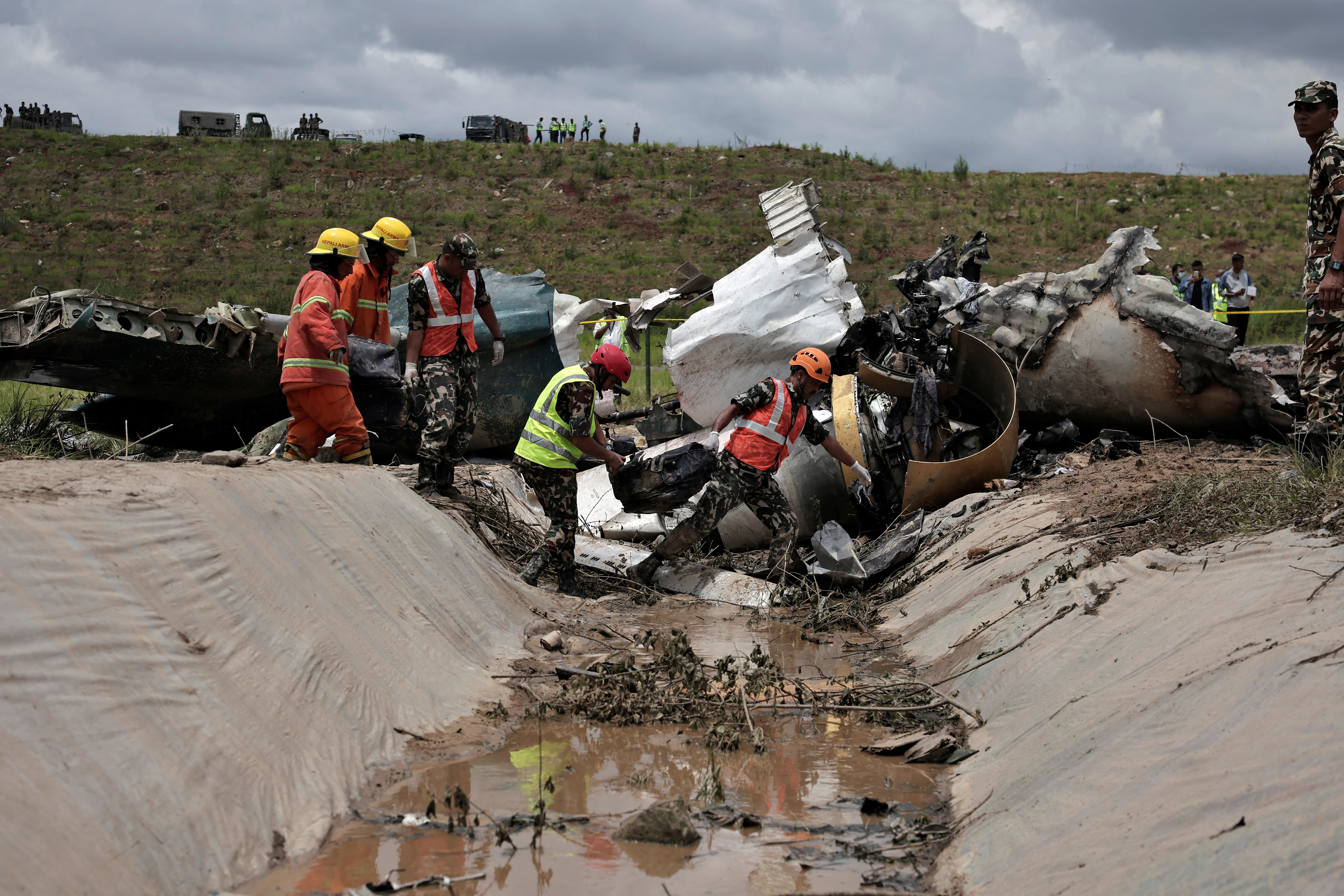 Plane crash at Nepal's Kathmandu airport kills 18 people
