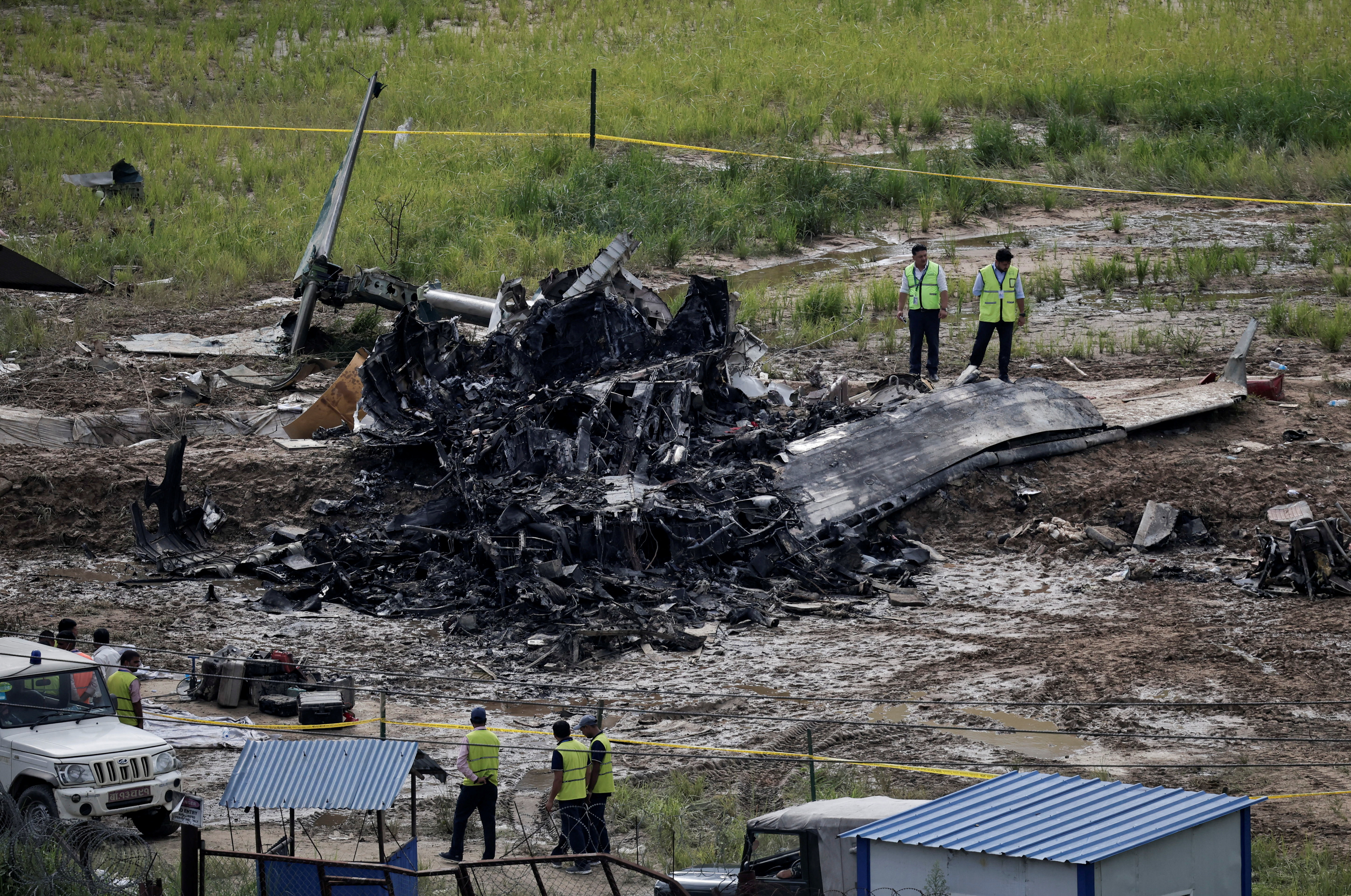 Plane crash at Nepal's Kathmandu airport kills 18 people