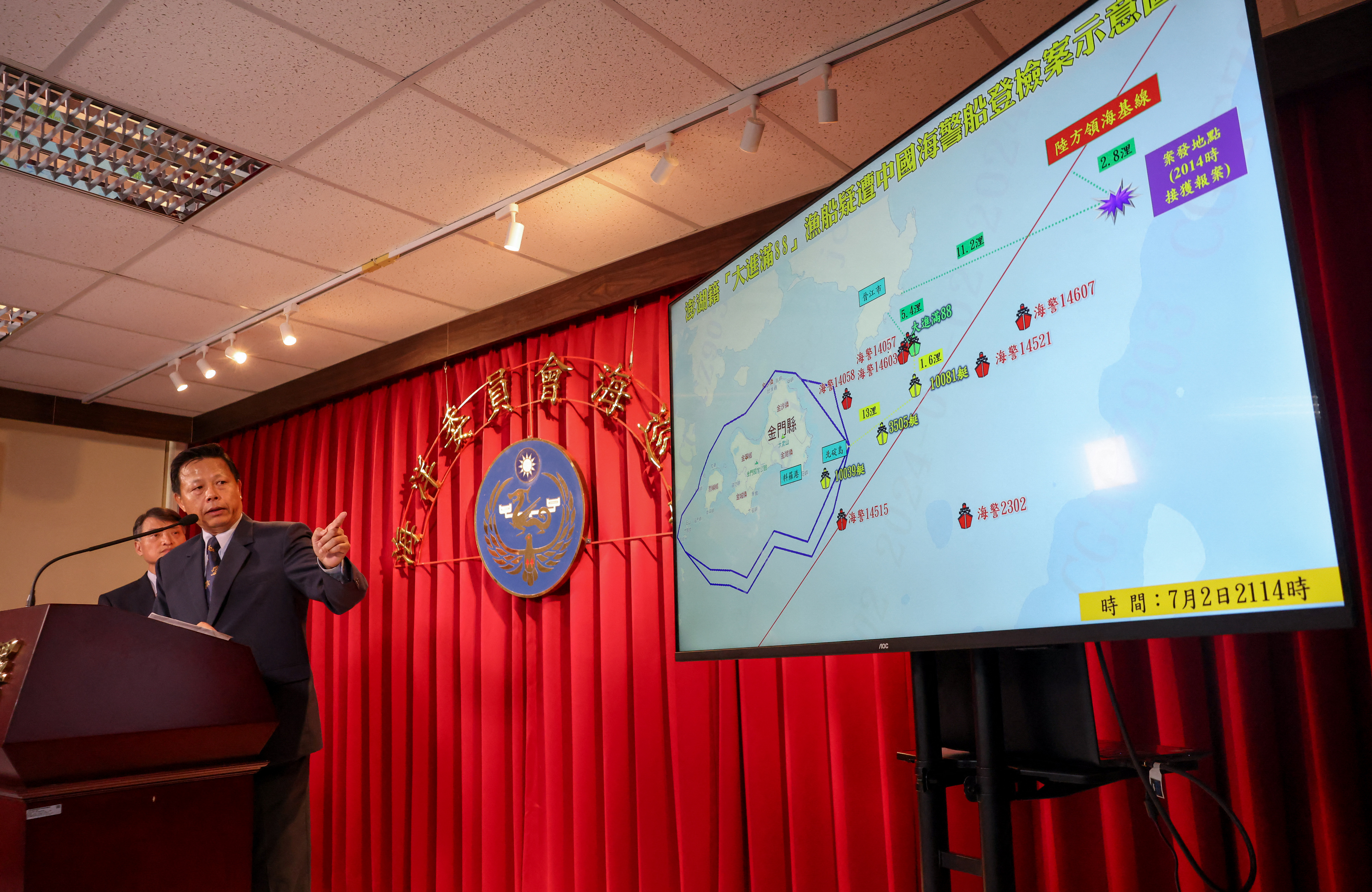 Deputy Director General of Taiwan's Coast Guard Administration Ching-Chin Hsieh explains the case of a Taiwanese fishing boat was seized by China's coast guard, during a news conference at Taiwan's Coast Guard Administration in Taipei on July 3, 2024.