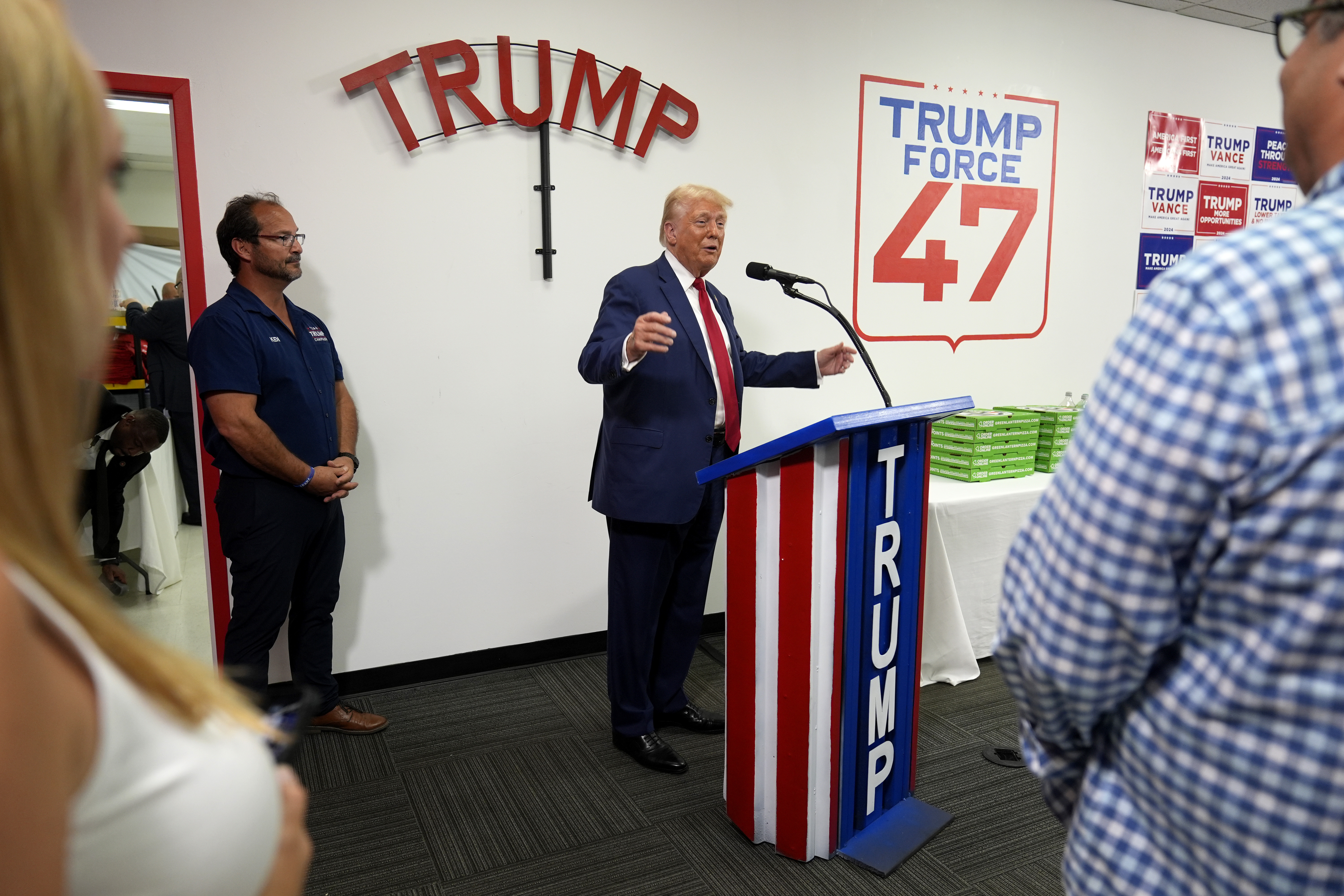 Former President Donald Trump speaks during a stop at a campaign office on August 26, in Roseville, Michigan