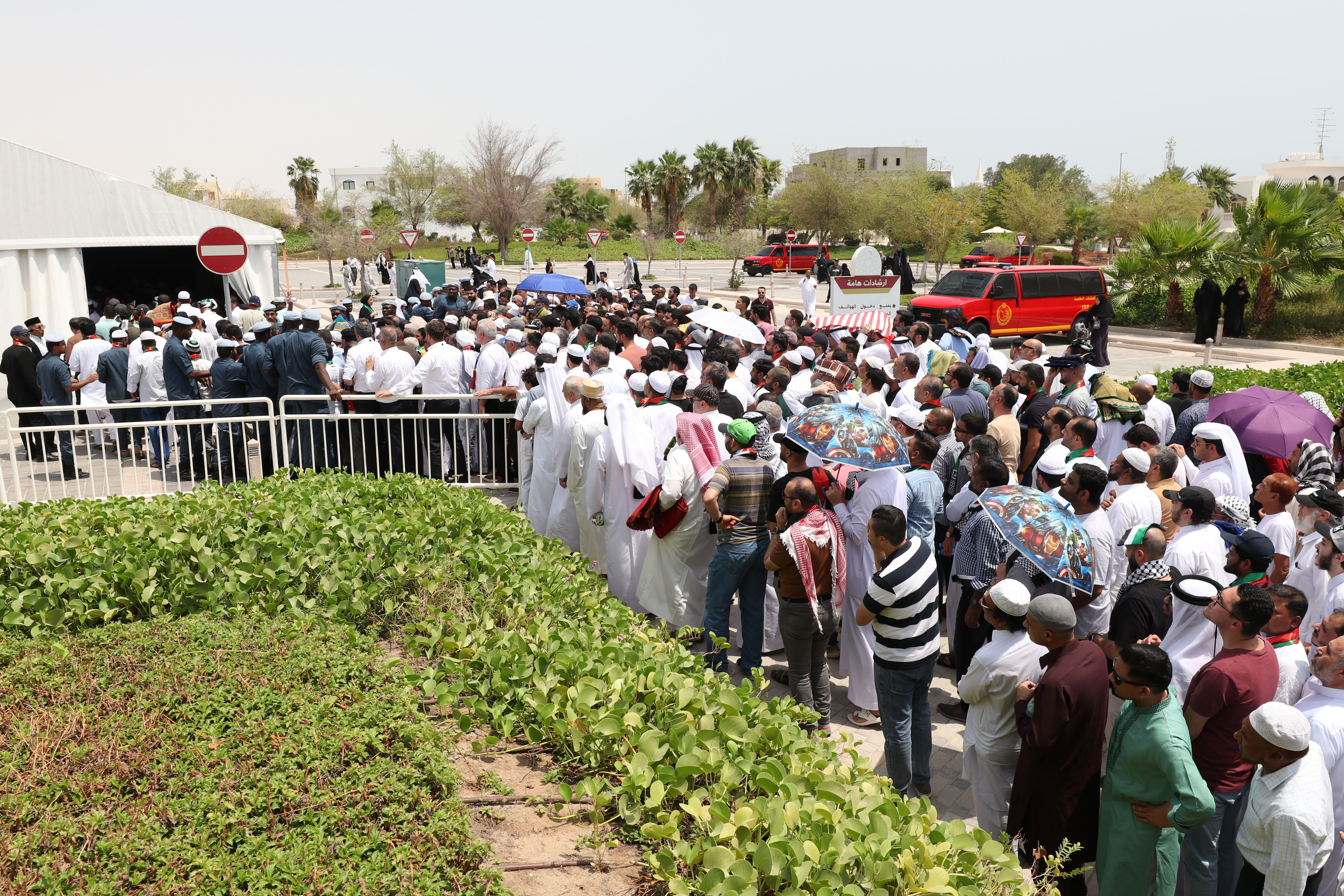 People gather at Imam Muhammad ibn Abd al-Wahhab Mosque in Doha for Friday prayer before the burial of Hamas leader Ismail Haniyeh