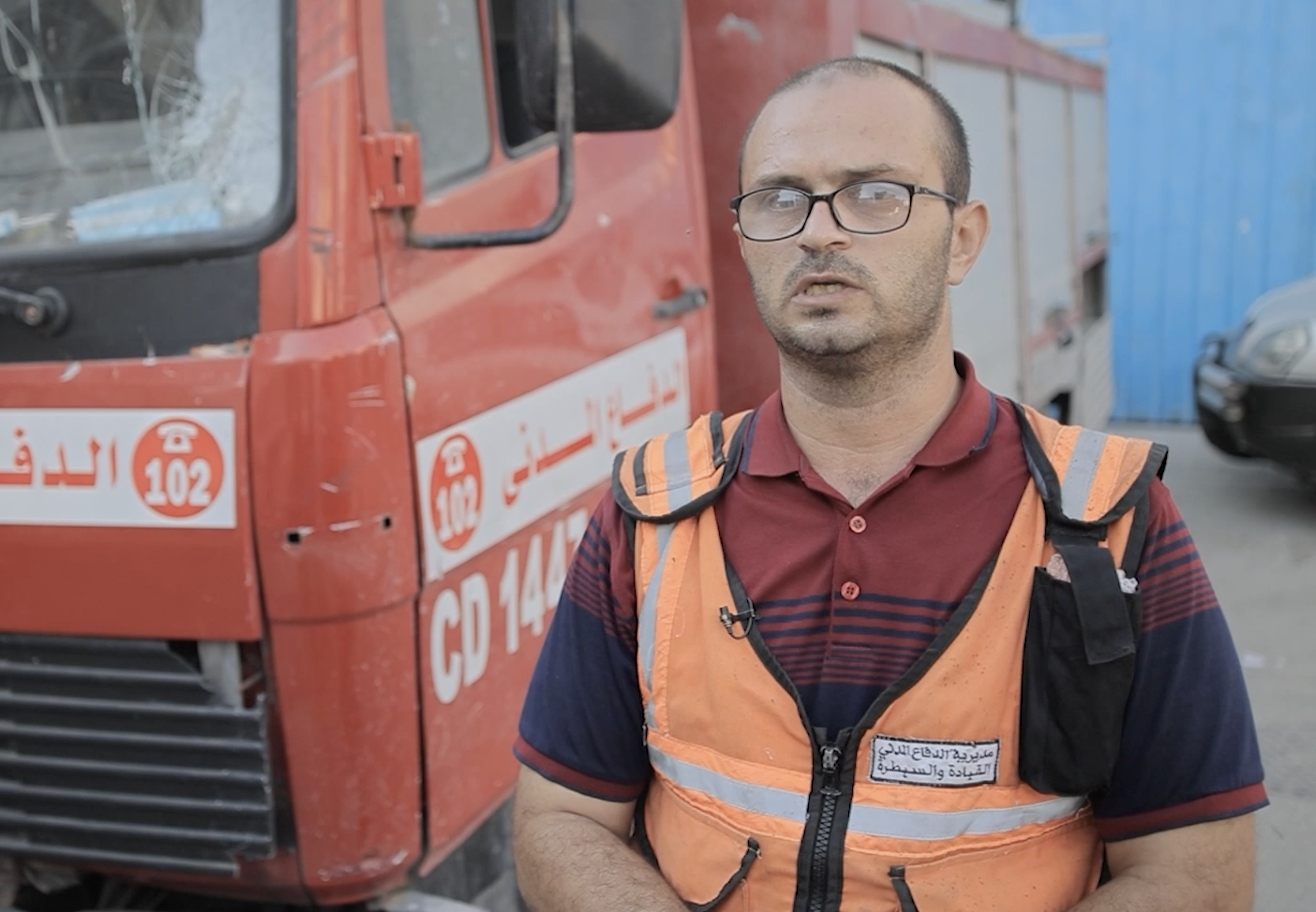 Mo'men Silmi headed the first civil defence team to get to the al-Tabin school after Israel attacked it, killing at least 100 people [Screengrab/Sanad Verification Agency/Al Jazeera]
