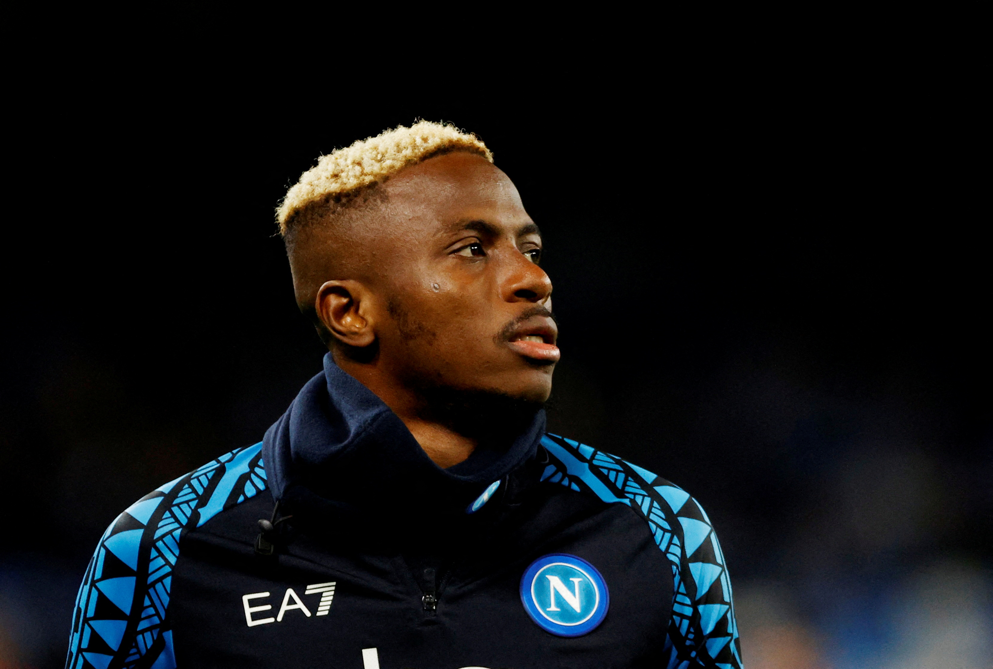 Soccer Football - Champions League - Group C - Napoli v S.C. Braga - Stadio Diego Armando Maradona, Naples, Italy - December 12, 2023 Napoli's Victor Osimhen during the warm up before the match REUTERS/Ciro De Luca REFILE - LOCATION and EVENT