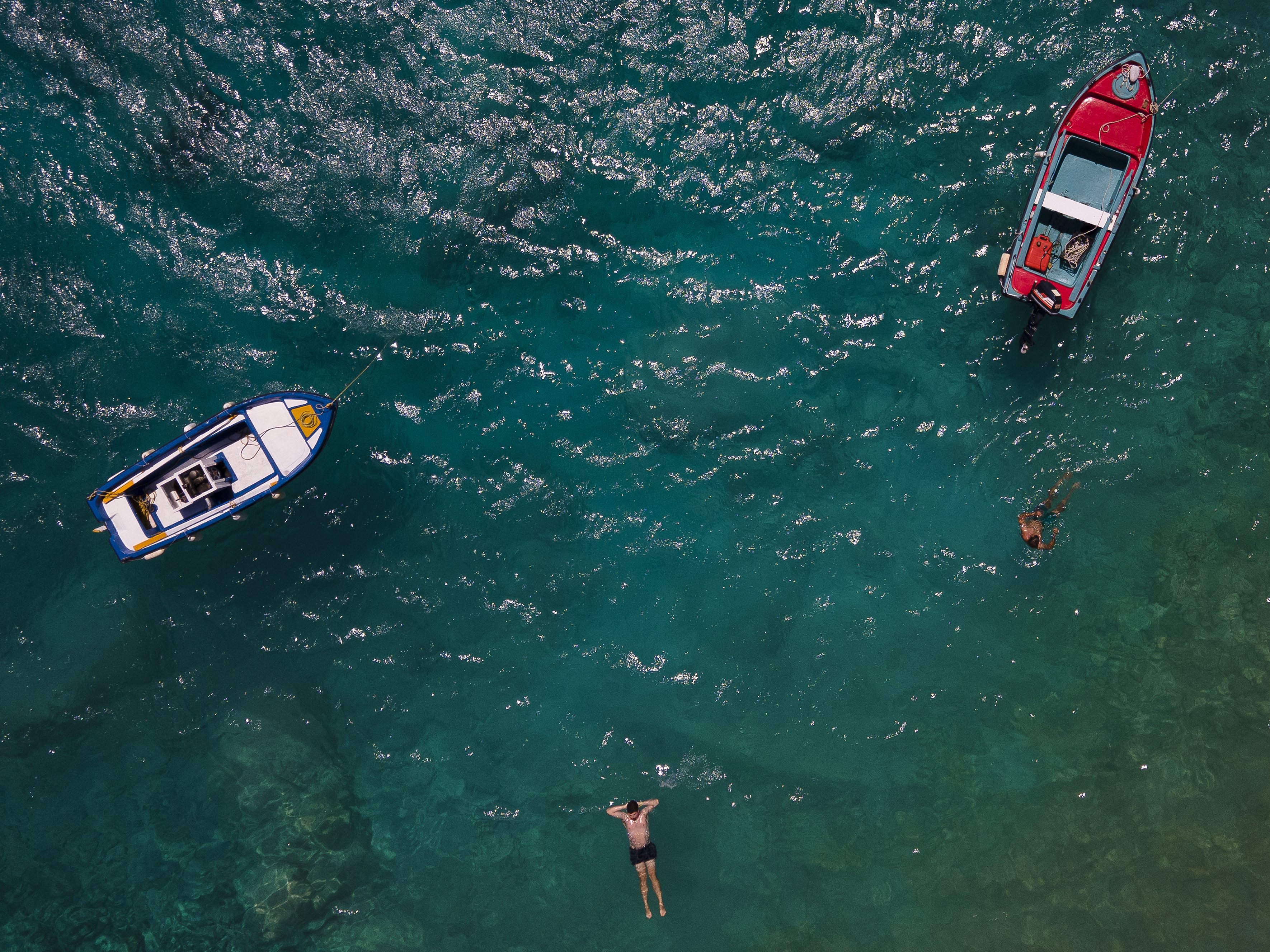 People swimming off the island of Ikaria, Greece, on August 21, 2020