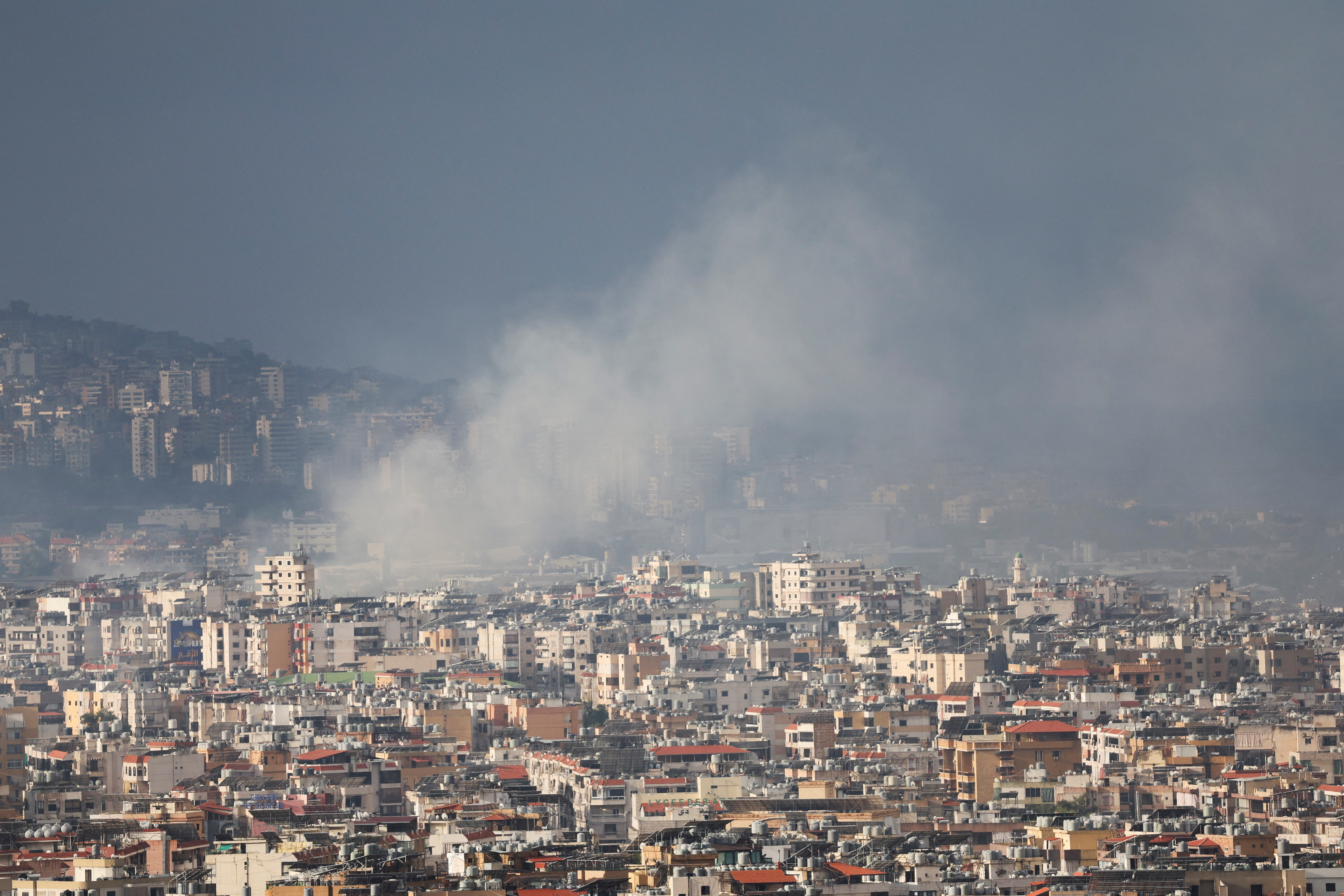 Smoke rises over Beirut’s southern suburbs after a strike, amid the ongoing hostilities between Hezbollah and Israeli forces