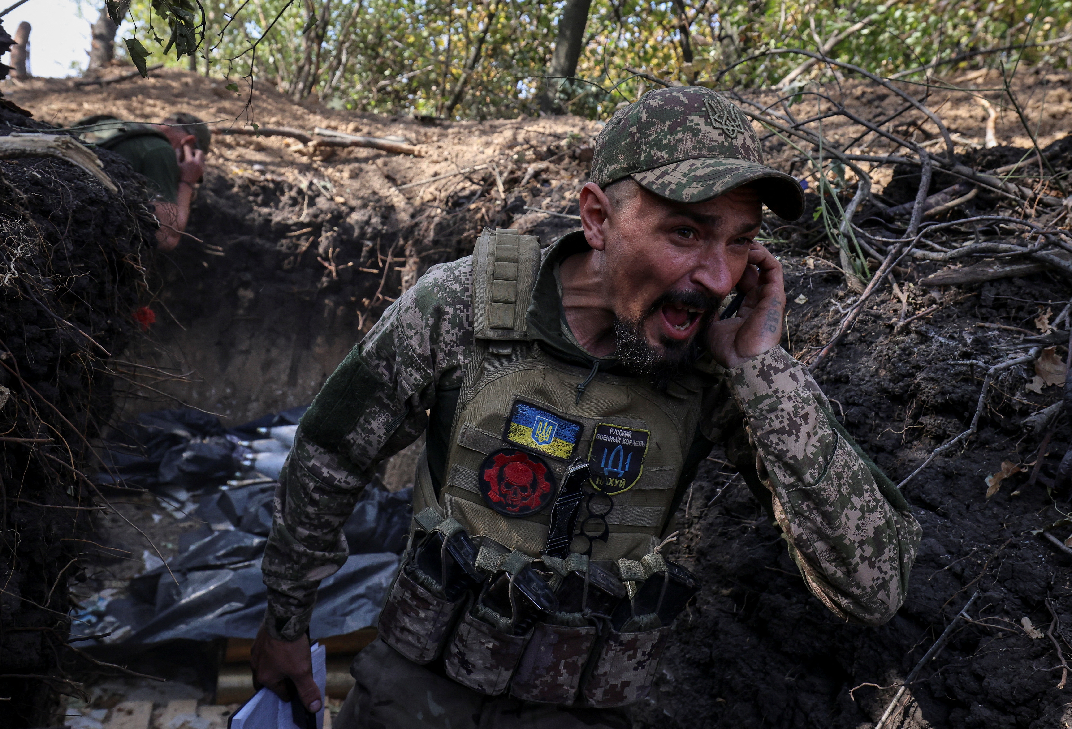 Artillerymen of the 15th Operative Purpose Brigade 'Kara-Dag' of the National Guard of Ukraine react as they fire a 2S1 Gvozdika self-propelled howitzer towards Russian troops at a frontline, amid Russia's attack on Ukraine, near the town of Pokrovsk in Donetsk region, Ukraine, October 3, 2024. Radio Free Europe/Radio Liberty/Serhii Nuzhnenko via REUTERS THIS IMAGE HAS BEEN SUPPLIED BY A THIRD PARTY