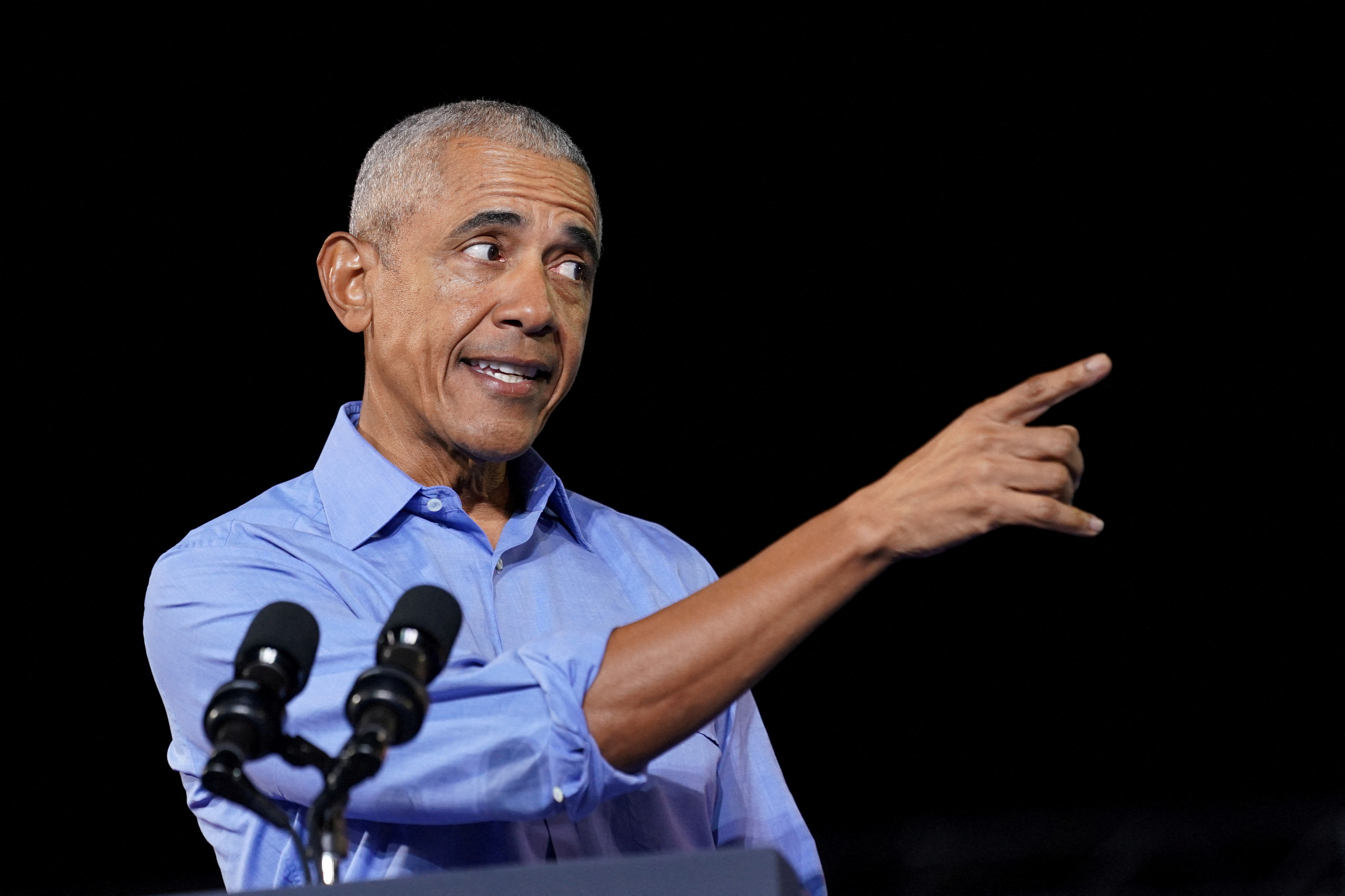 Barack Obama, pointing in gesture at a rally