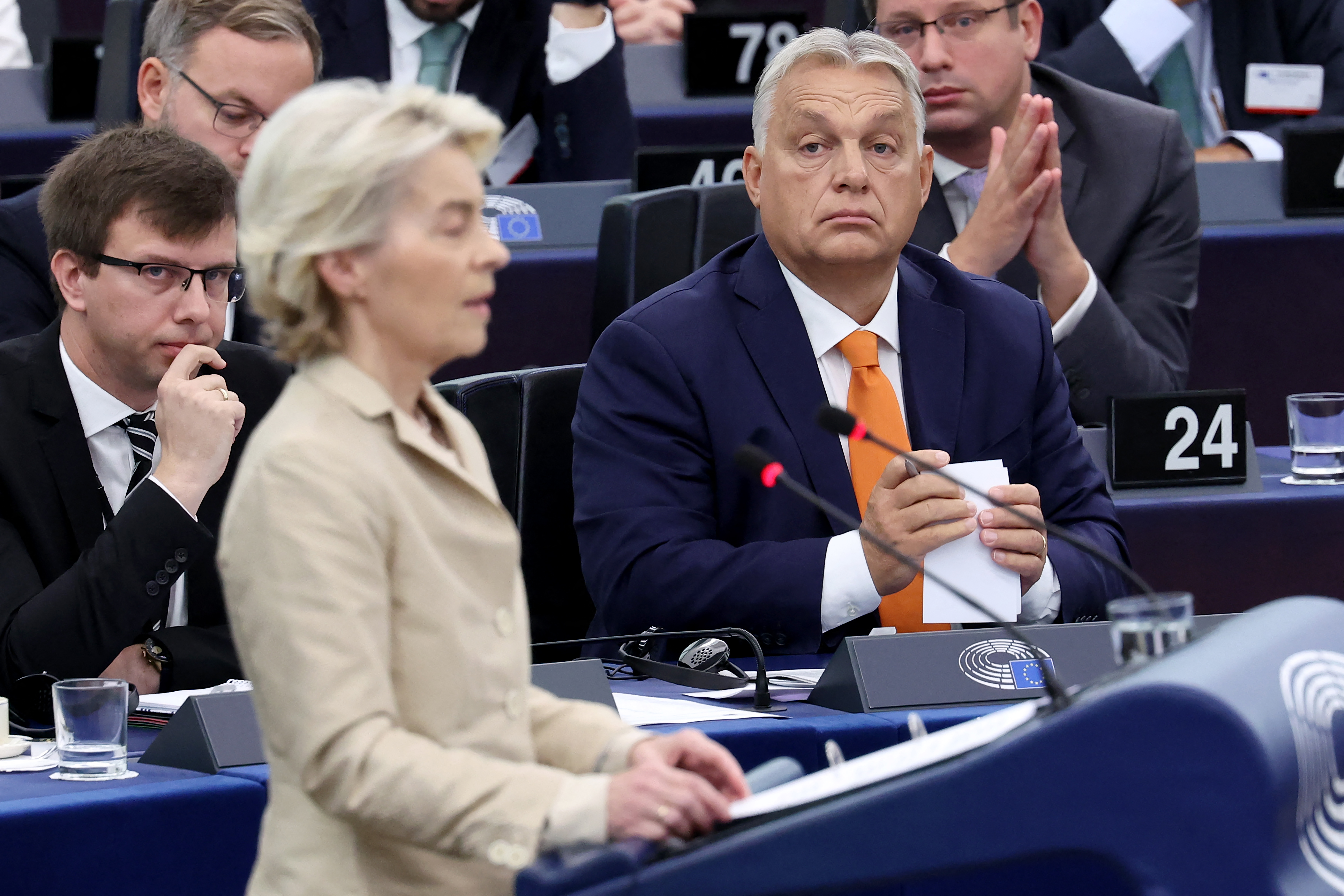 Hungary's Prime Minister Viktor Orban listens to European Commission President Ursula von der Leyen