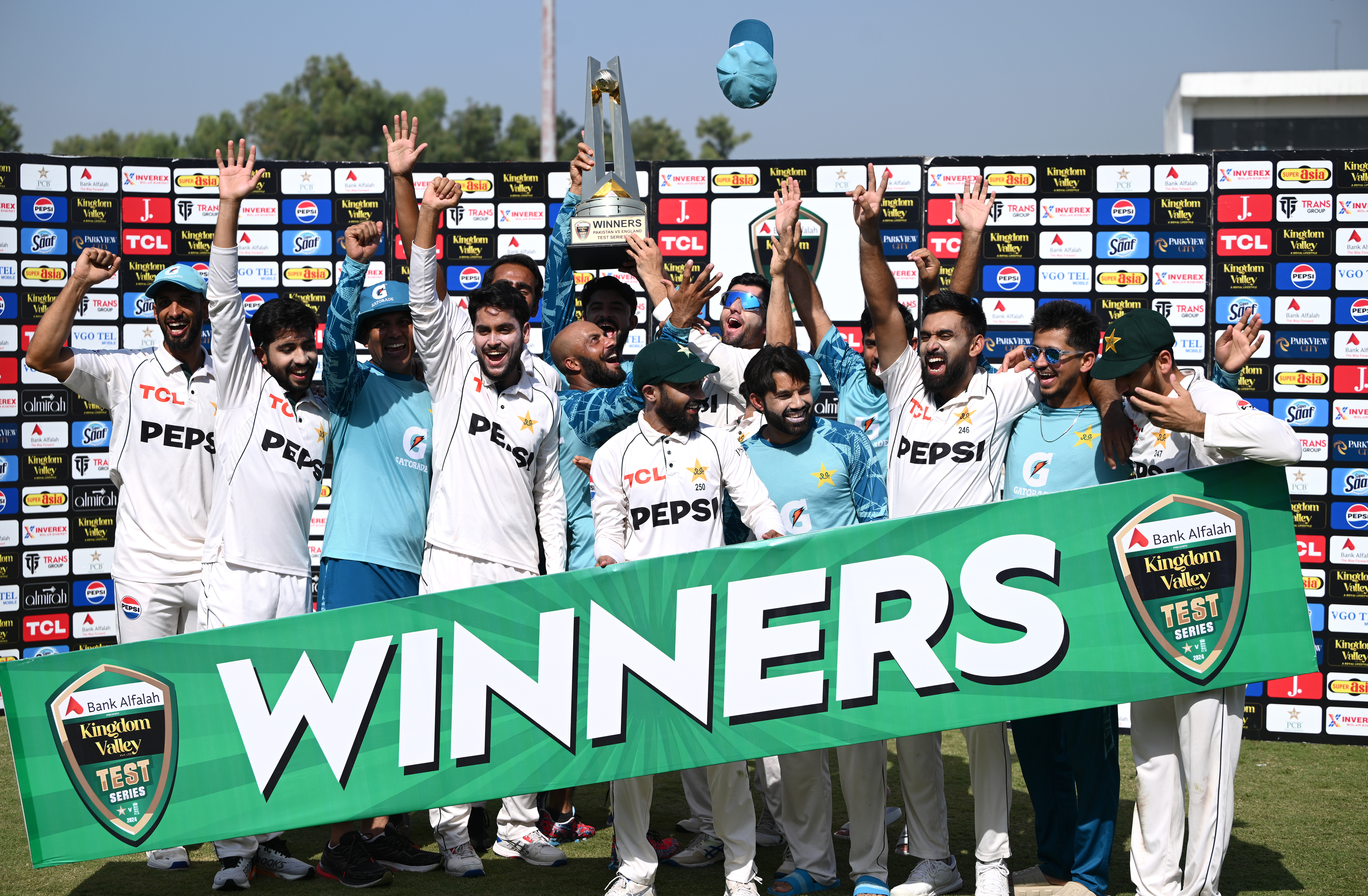 RAWALPINDI, PAKISTAN - OCTOBER 26: The Pakistan team celebrate after they had won the match and series after day three of the 3rd Test Match between Pakistan and England at Rawalpindi Cricket Stadium on October 26, 2024 in Rawalpindi, Pakistan. (Photo by Stu Forster/Getty Images)