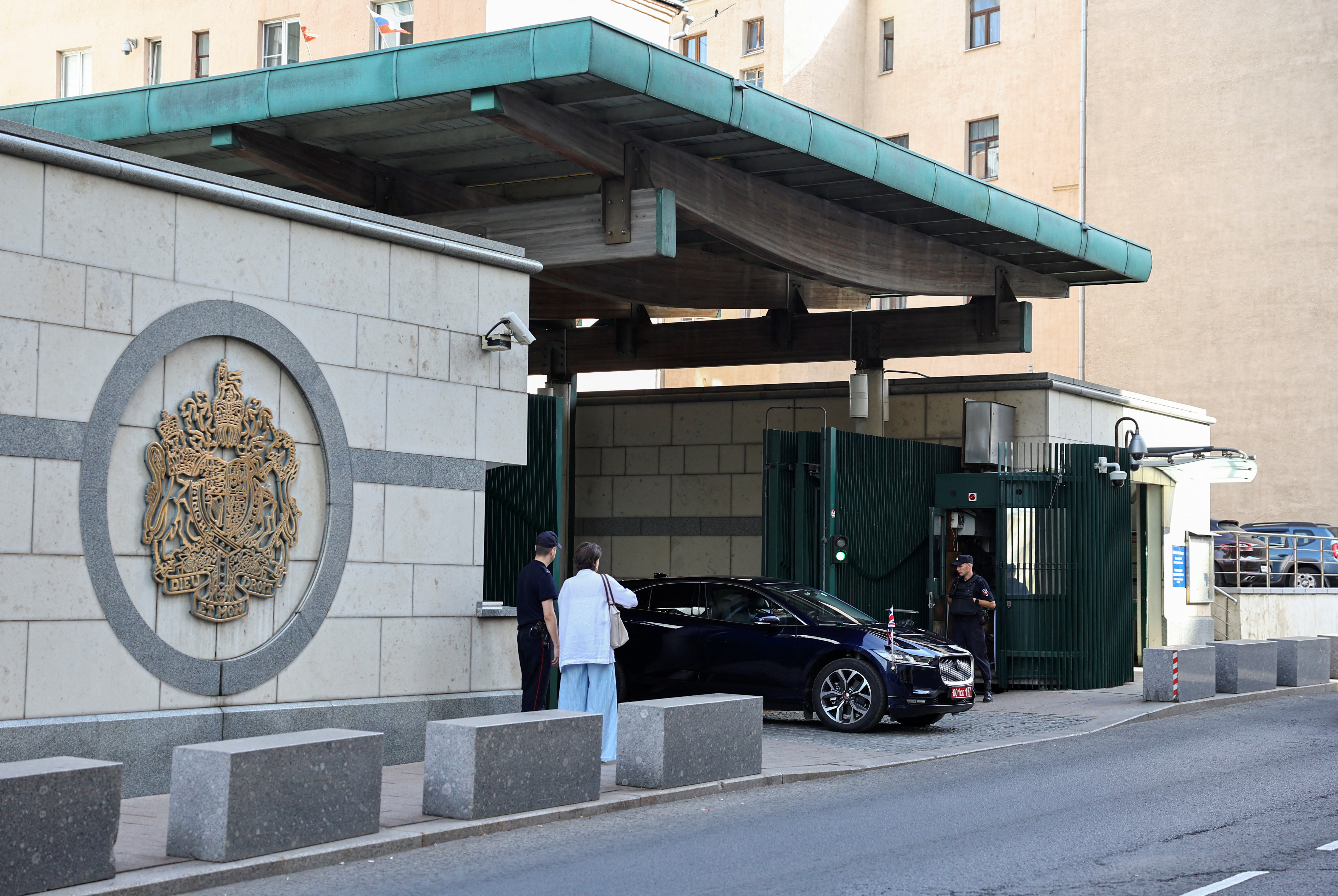 A car of the British ambassador drives out of the embassy in Moscow