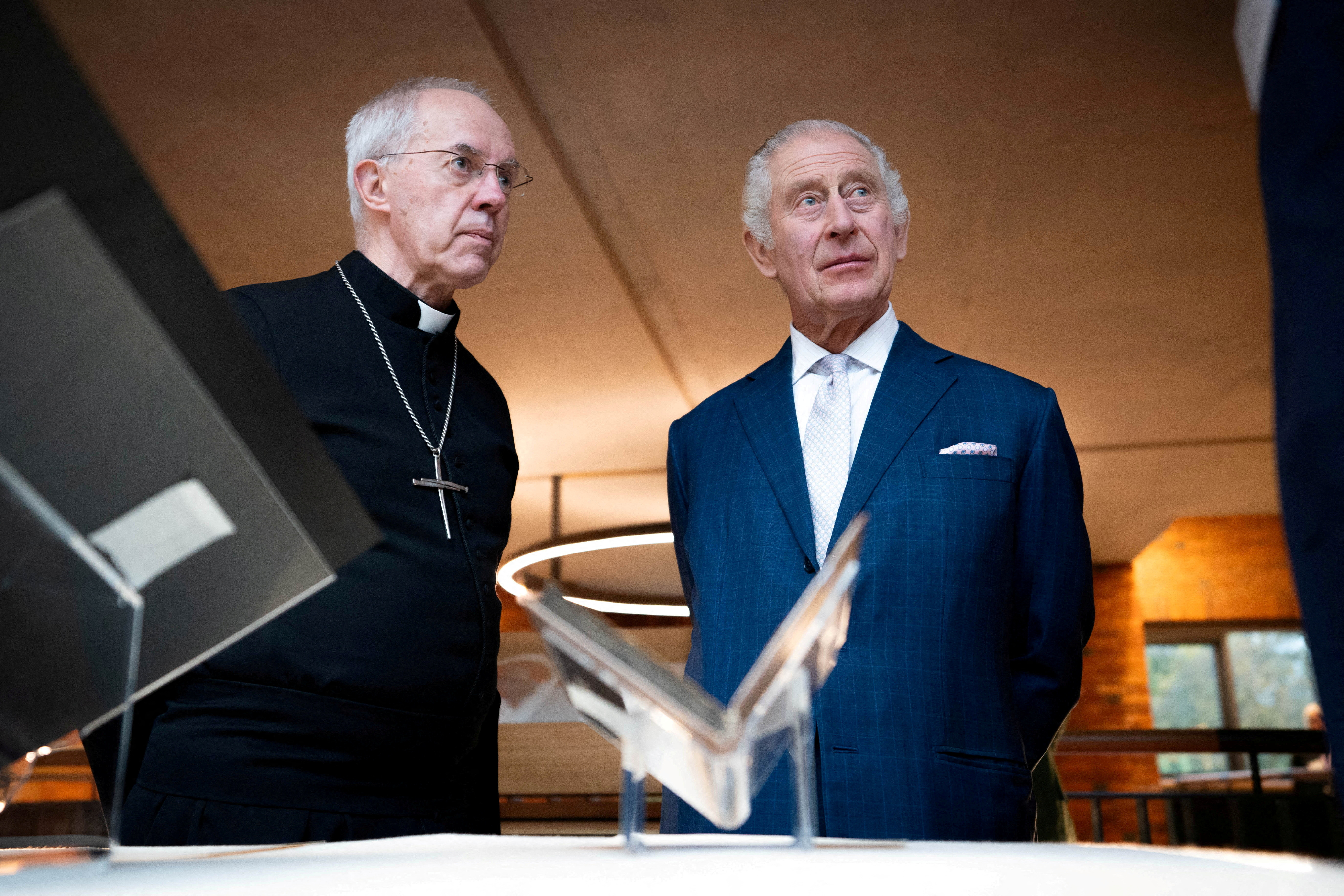 Britain’s King Charles III, right, and Archbishop of Canterbury Justin Welby attend a reception of faith leaders at the new Lambeth Palace Library in London