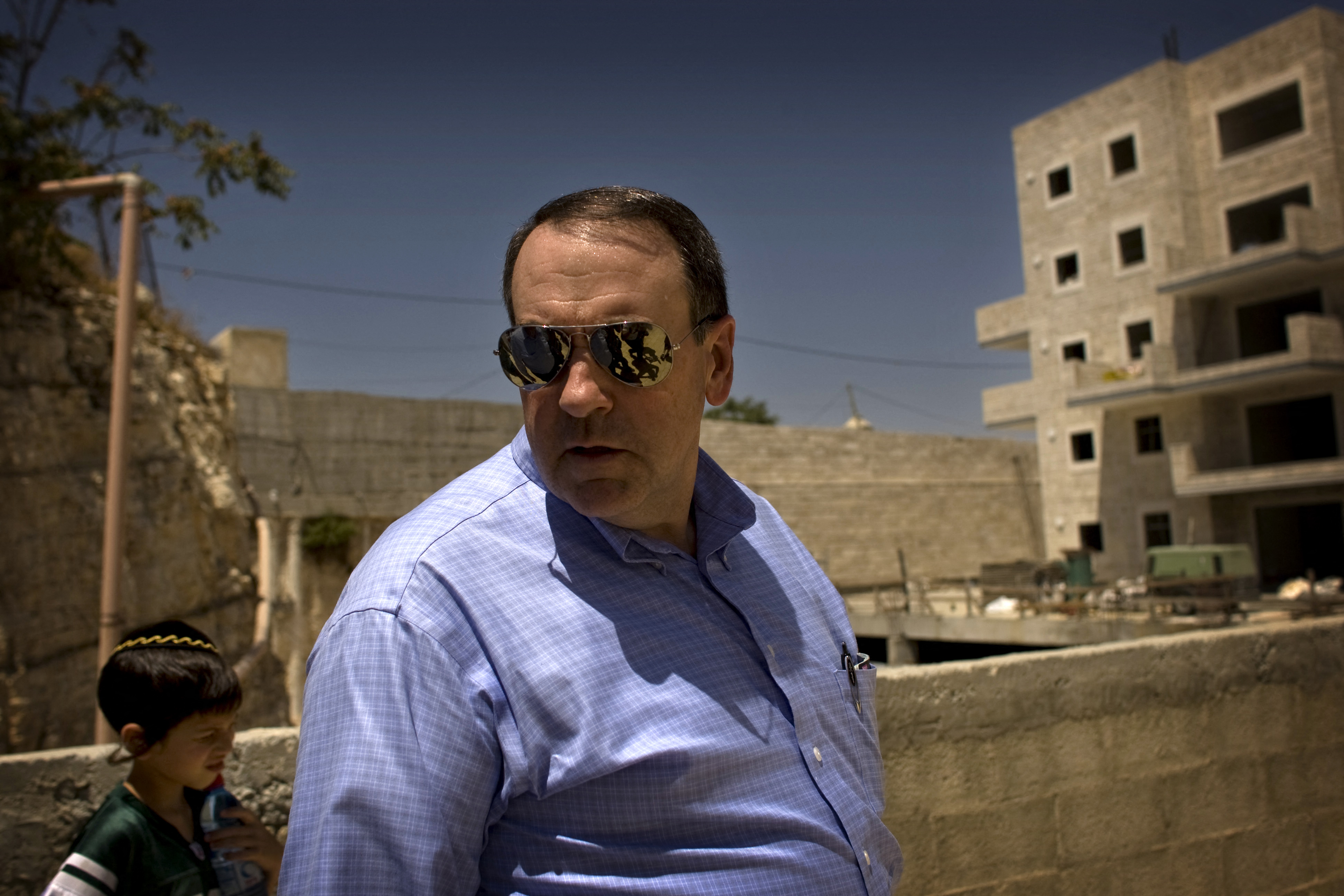 Former Arkansas Governor Mike Huckabee visits an enclave of Jewish settlers called Maale HaZeitim in the Ras Alamud neighbourhood of occupied East Jerusalem on August 17, 2009