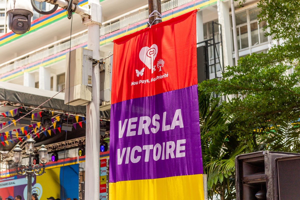A banner in support of Alliance du Changement party is seen during a campaign rally led by former Prime Minister and candidate Navin Ramgoolam in Port Louis on November 3, 2024, ahead of the general election.