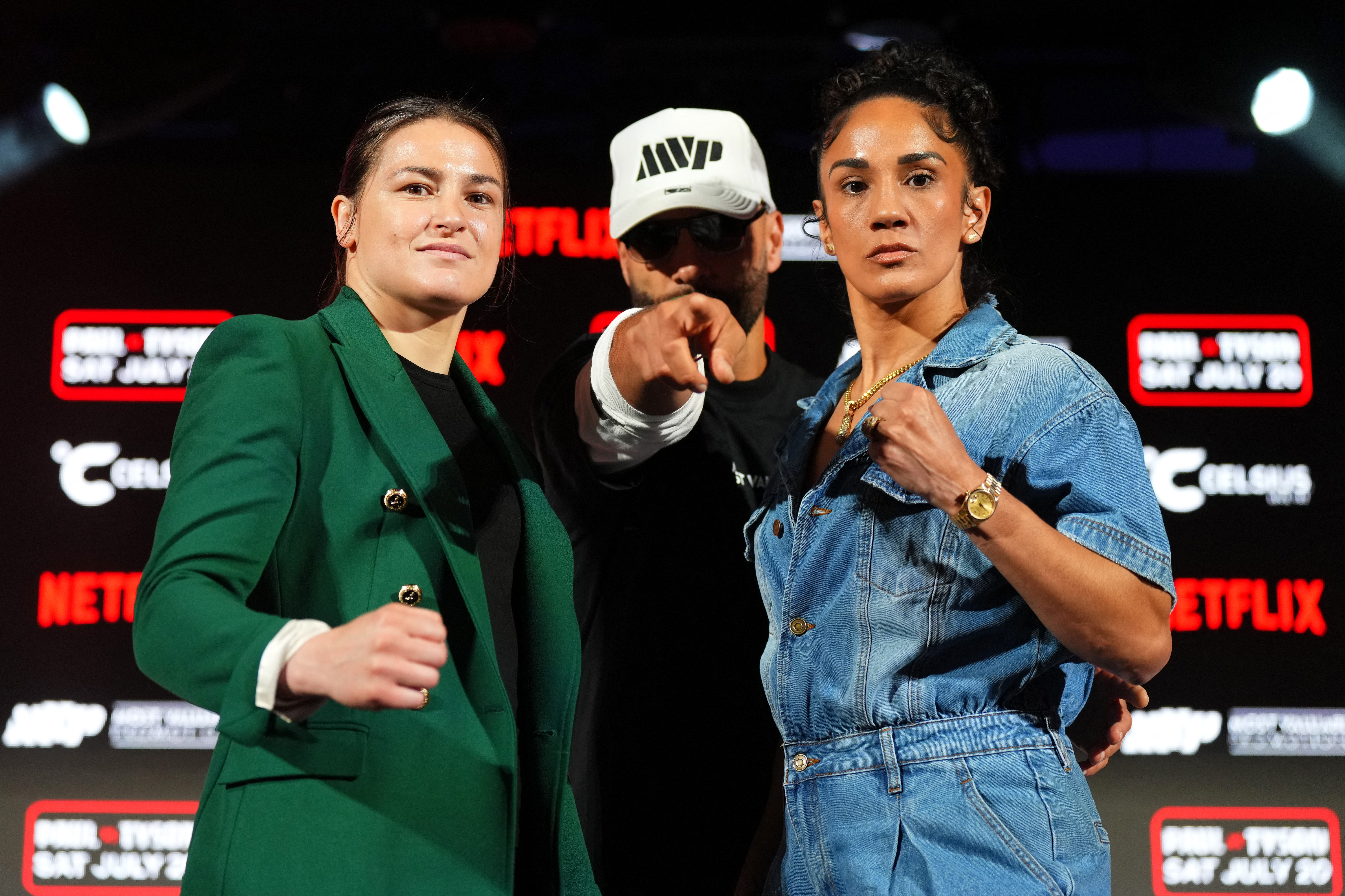 ARLINGTON, TEXAS - MAY 16: (L-R) Katie Taylor, Nakisa Bidarian and Amanda Serrano pose onstage during the Jake Paul vs. Mike Tyson Boxing match Arlington press conference at Texas Live! on May 16, 2024 in Arlington, Texas. Cooper Neill/Getty Images for Netflix/AFP (Photo by Cooper Neill / GETTY IMAGES NORTH AMERICA / Getty Images via AFP)