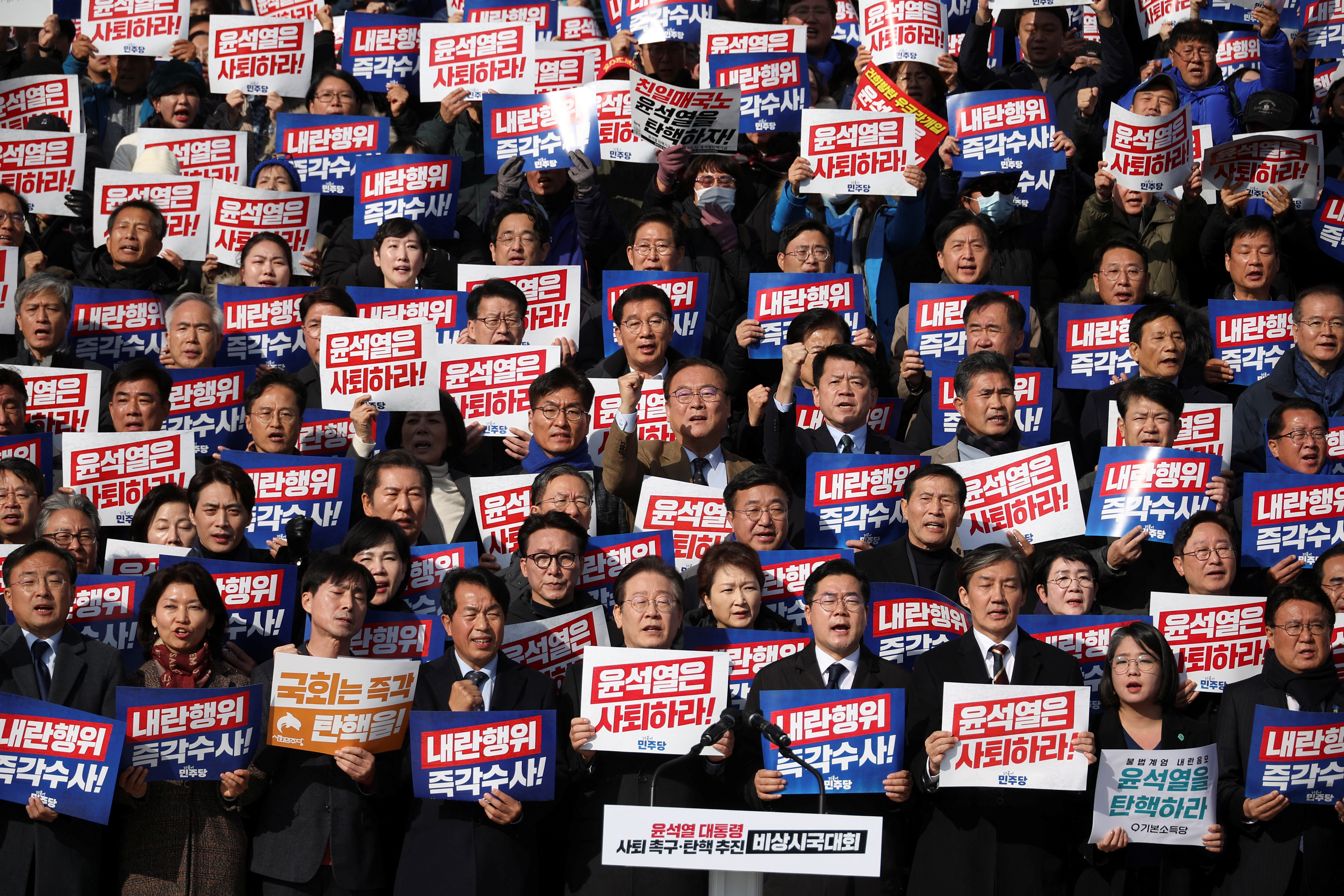 South Korea's main opposition Democratic Party leader Lee Jae-myung, lawmakers and people attend a rally to condemn South Korean President’s surprise declarations