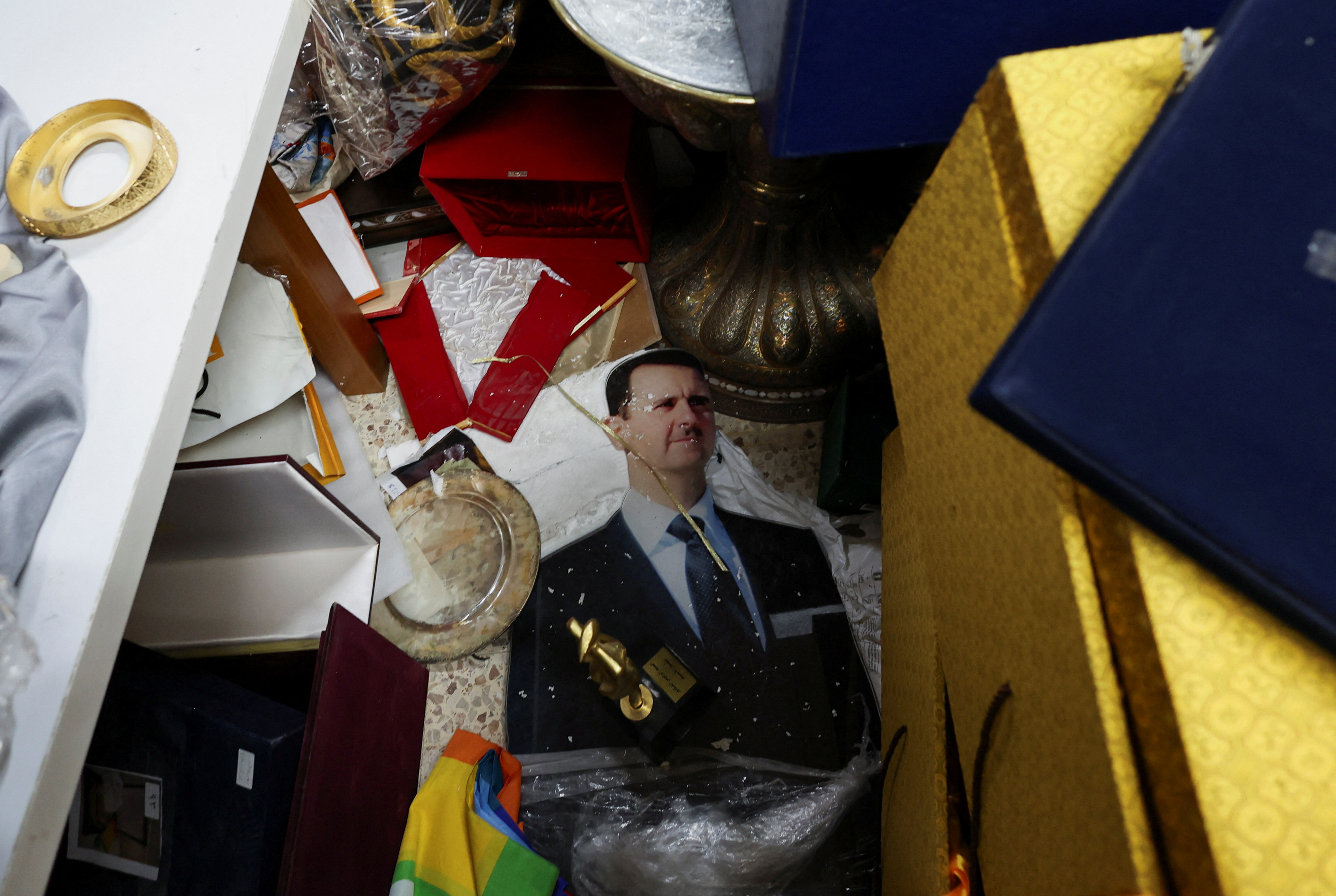 Personal items retrieved from one of the rooms at the Presidential Palace, known as Qasr al-Shaab or the ‘People’s Palace’, in Damascus after the city was seized by opposition fighters and President Bashar al-Assad was ousted