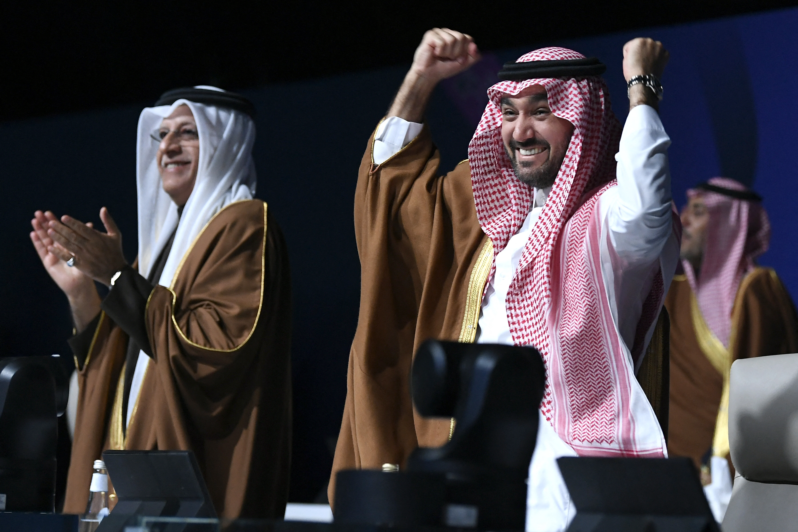 Saudi sports minister celebrates.
