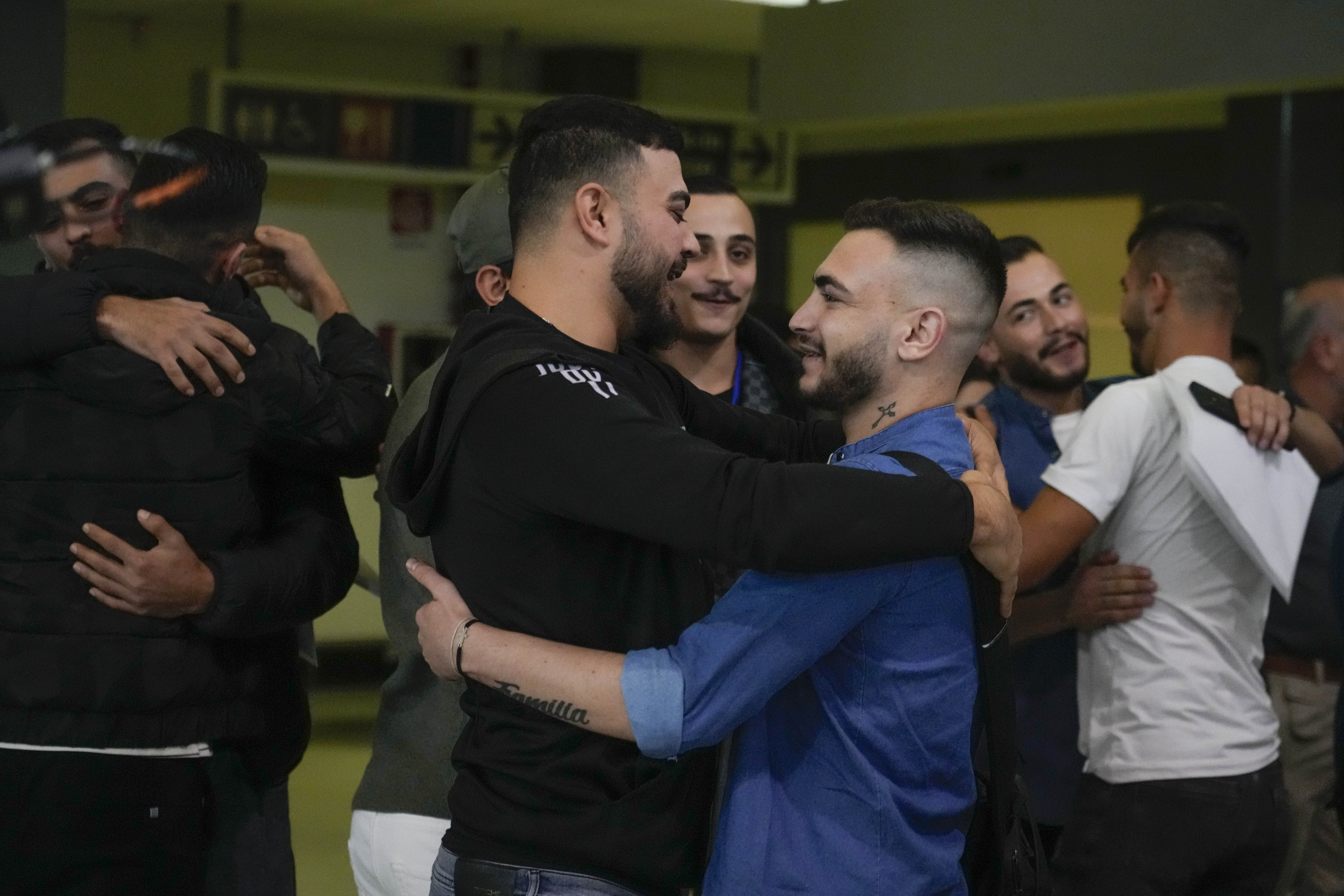 A group of 60 Syrian refugees fleeing war-torn Lebanon is welcomed at the Leonardo Da Vinci Airport in Rome, Italy on Tuesday, October 15, 2024, before the fall of Syria’s al-Assad regime. Now, Italy says it will suspend asylum applications