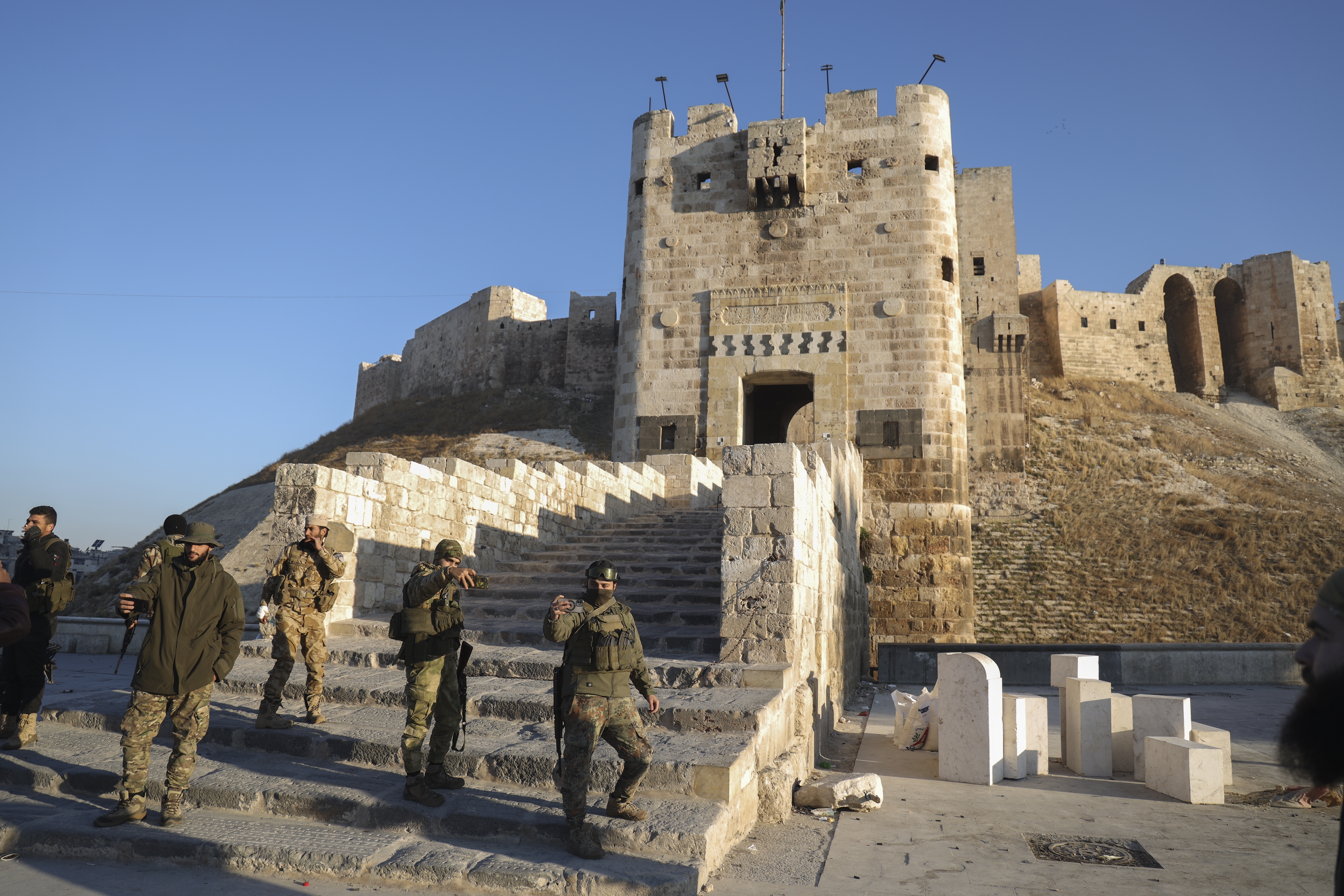 Syrian opposition fighters sweep into Aleppo