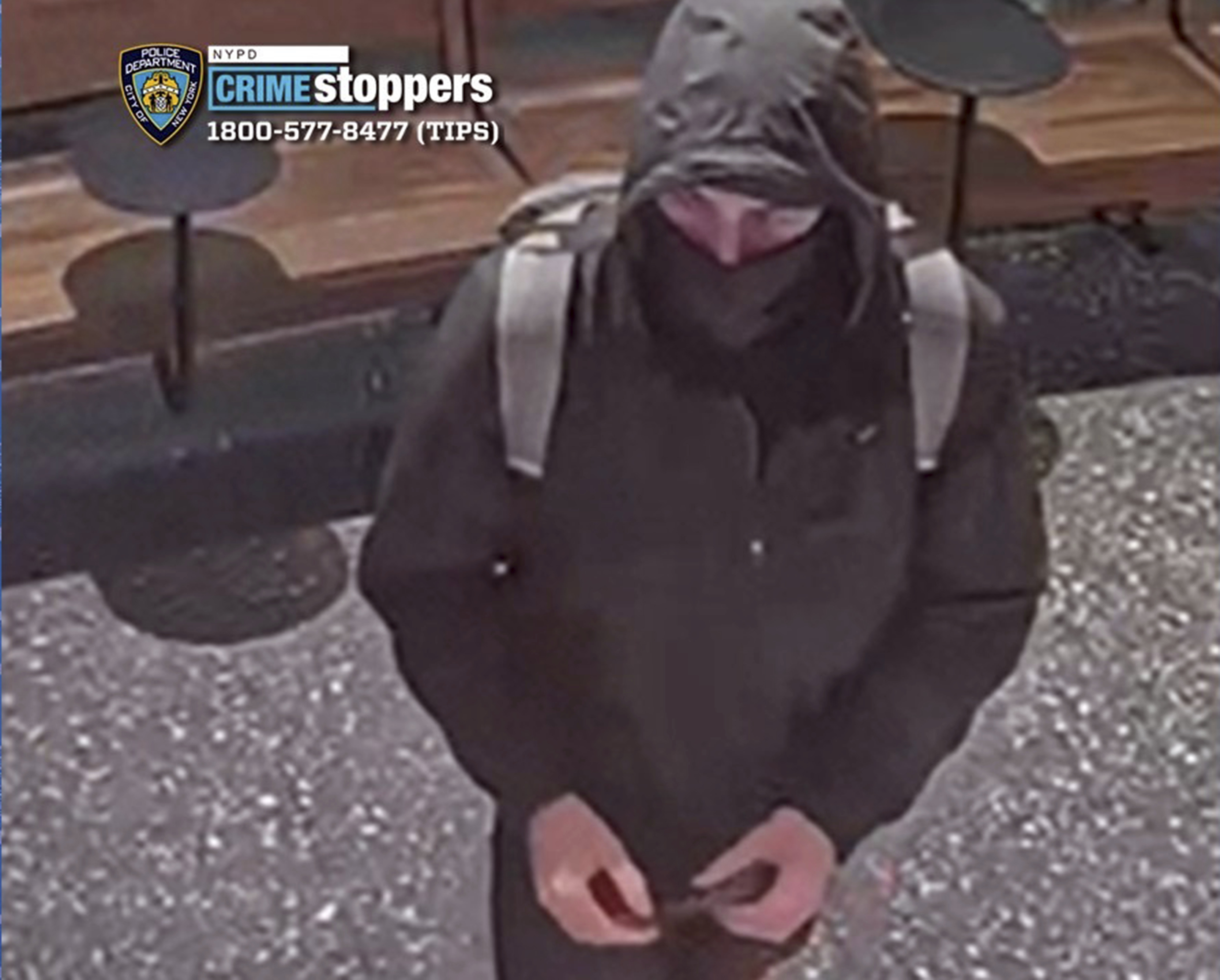 At around 6:30 am (11:30GMT), the shooter is seen walking from towards the crime scene, in a video released by the New York times, he appears to be on the phone.