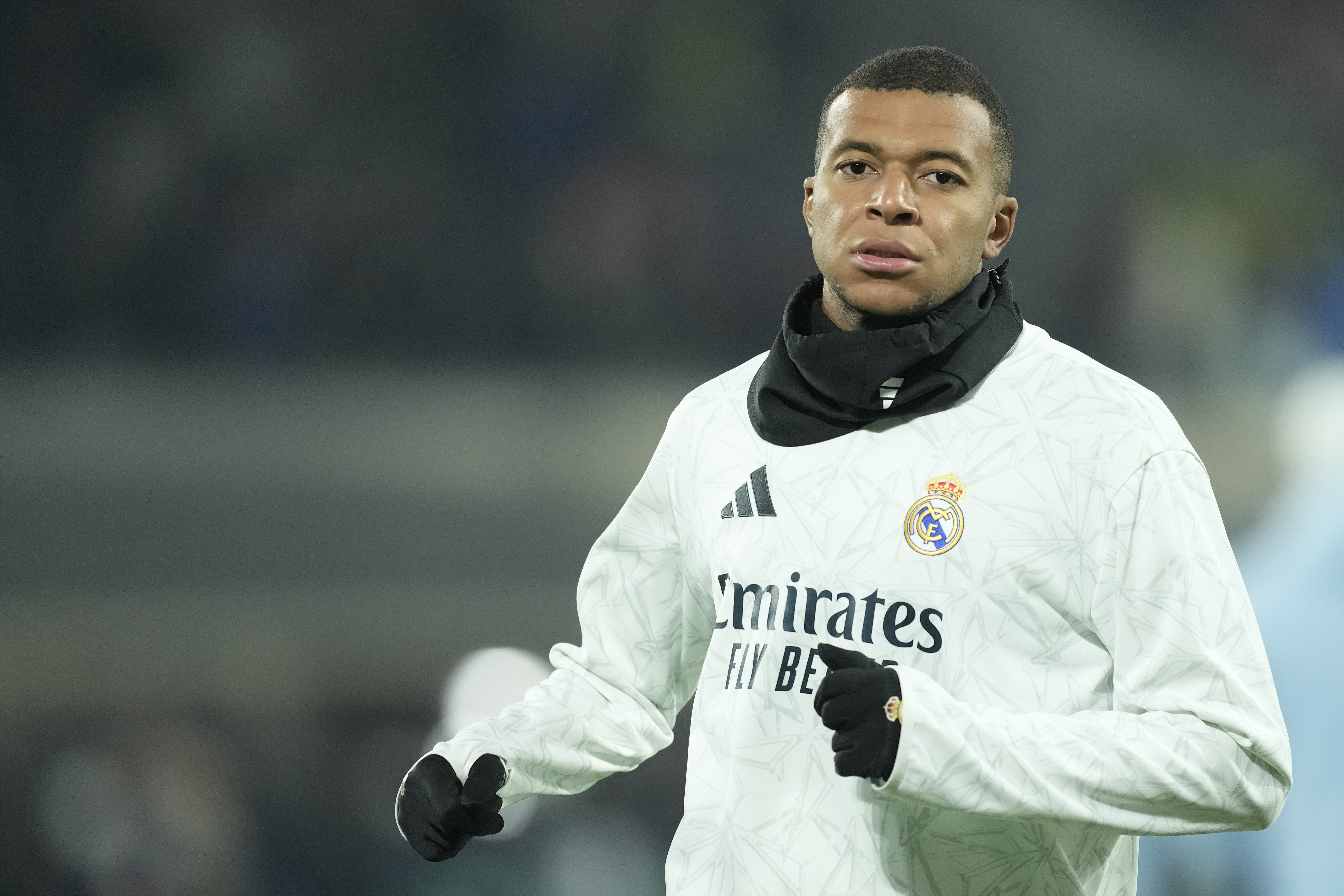 Kylian Mbappe warming up.