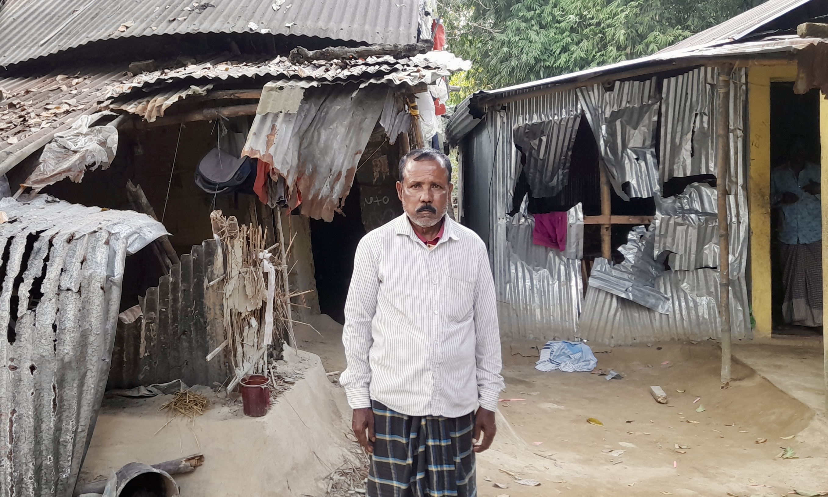 Krishna Das, a small-scale farmer from Monglargaon village in Sunamganj, stands outside his ruined home and recalls the mayhem caused by a Muslim mob following an alleged blasphemy incident. His family was forced to flee in fear