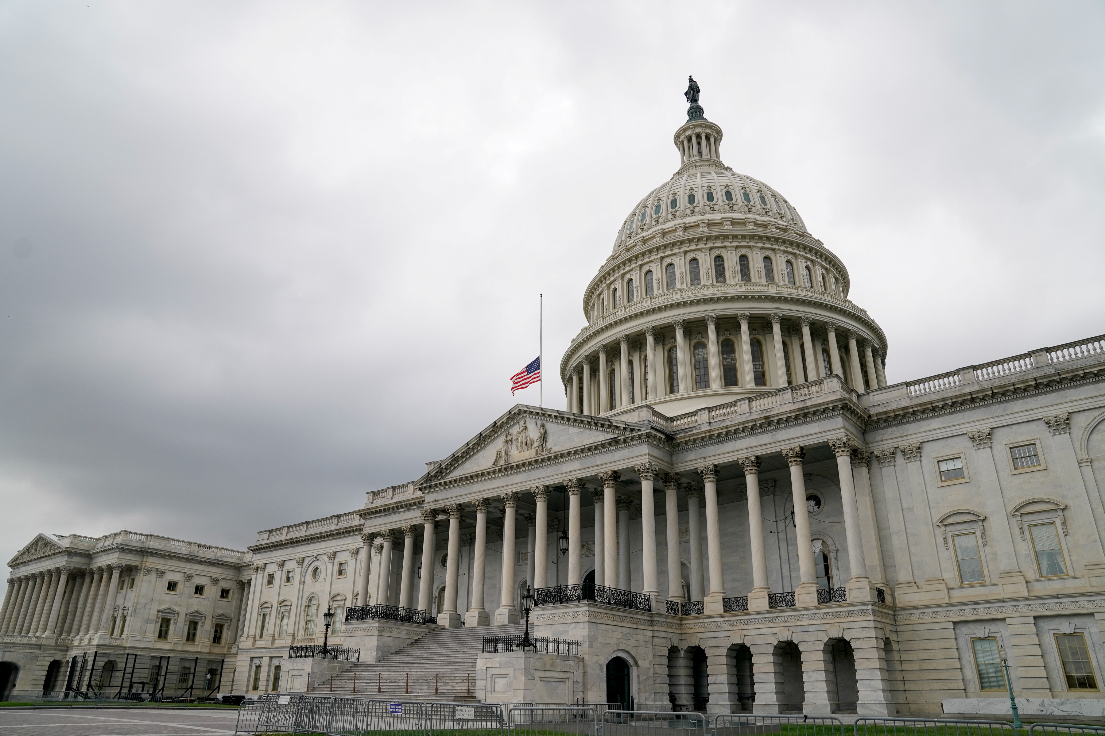The U.S. flag flies at half staff at the U.S. Capitol to mark the 19th anniversary of the September 11 attacks in Washington, U.S., September 11, 2020. REUTERS/Erin Scott