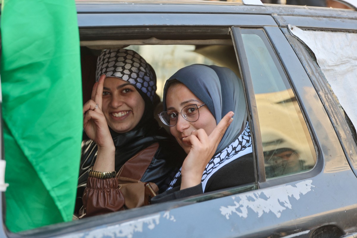 Palestinians celebrate the ceasefire announcement