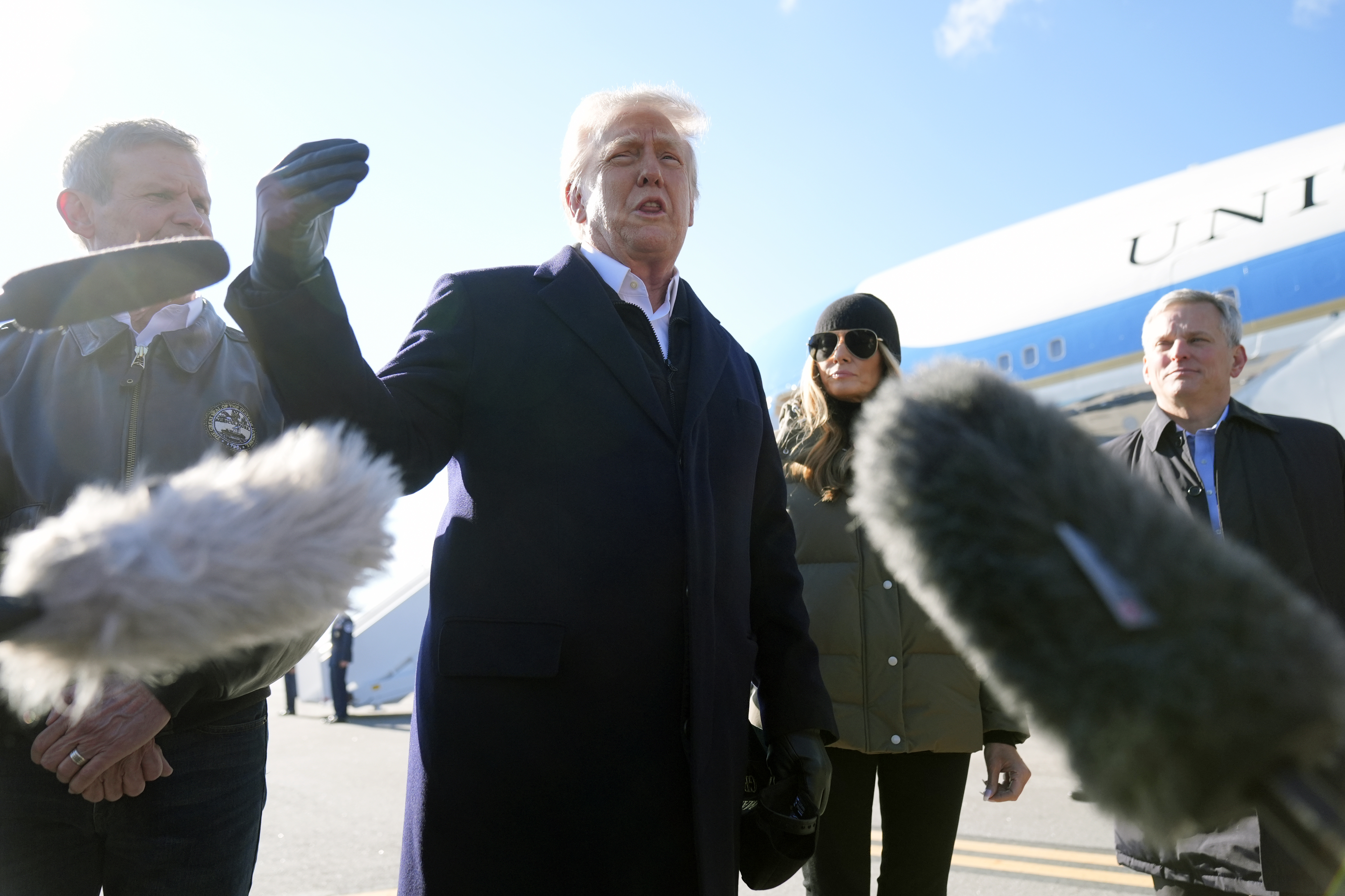 Donald Trump speaks to media outside Air Force One.