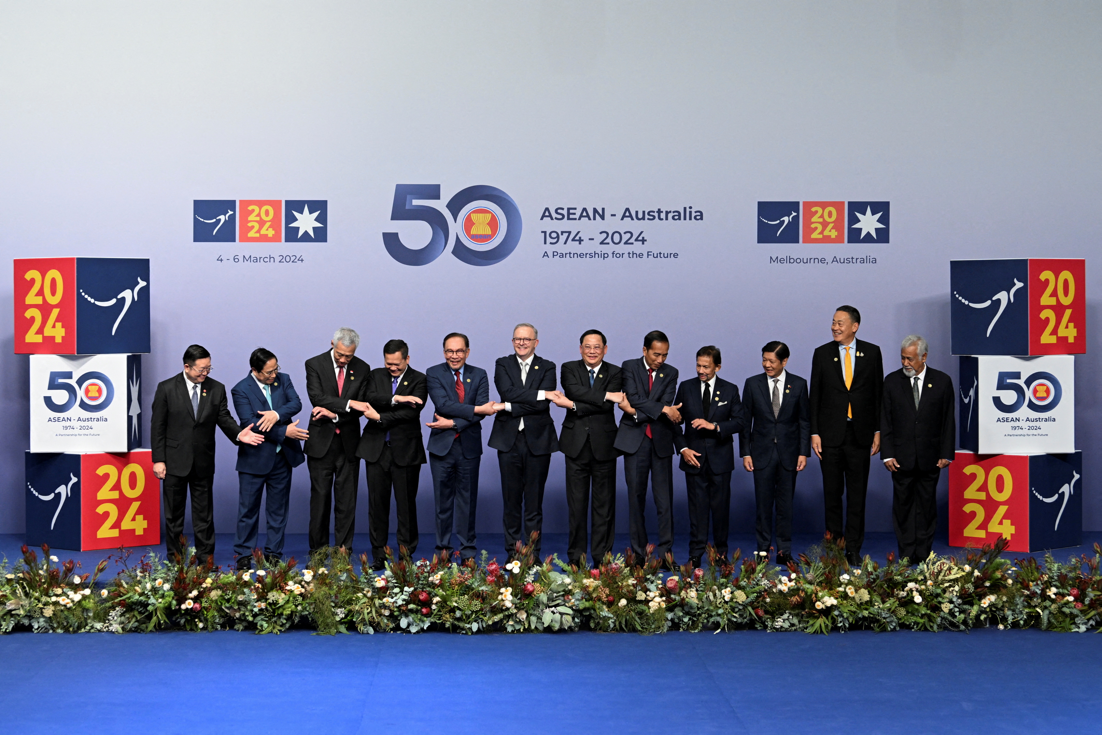 Australia's Prime Minister Anthony Albanese, Laos' Prime Minister Sonexay Siphandone, Brunei's Sultan Hassanal Bolkiah, Cambodia's Prime Minister Hun Manet, Indonesia's President Joko Widodo, Malaysia's Prime Minister Anwar Ibrahim, Philippines President Ferdinand Marcos Jr, Singapore's Prime Minister Lee Hsien Loong, Thailand's Prime Minister Srettha Thavisin, Vietnam's Prime Minister Pham Minh Chinh, Prime Minister of Timor-Leste Xanana Gusmao and Secretary-General of ASEAN, Dr Kao Kim Hourn pose for a family photo at the ASEAN-Australia Special Summit, in Melbourne, Australia March 5, 2024. REUTERS/Jaimi Joy
