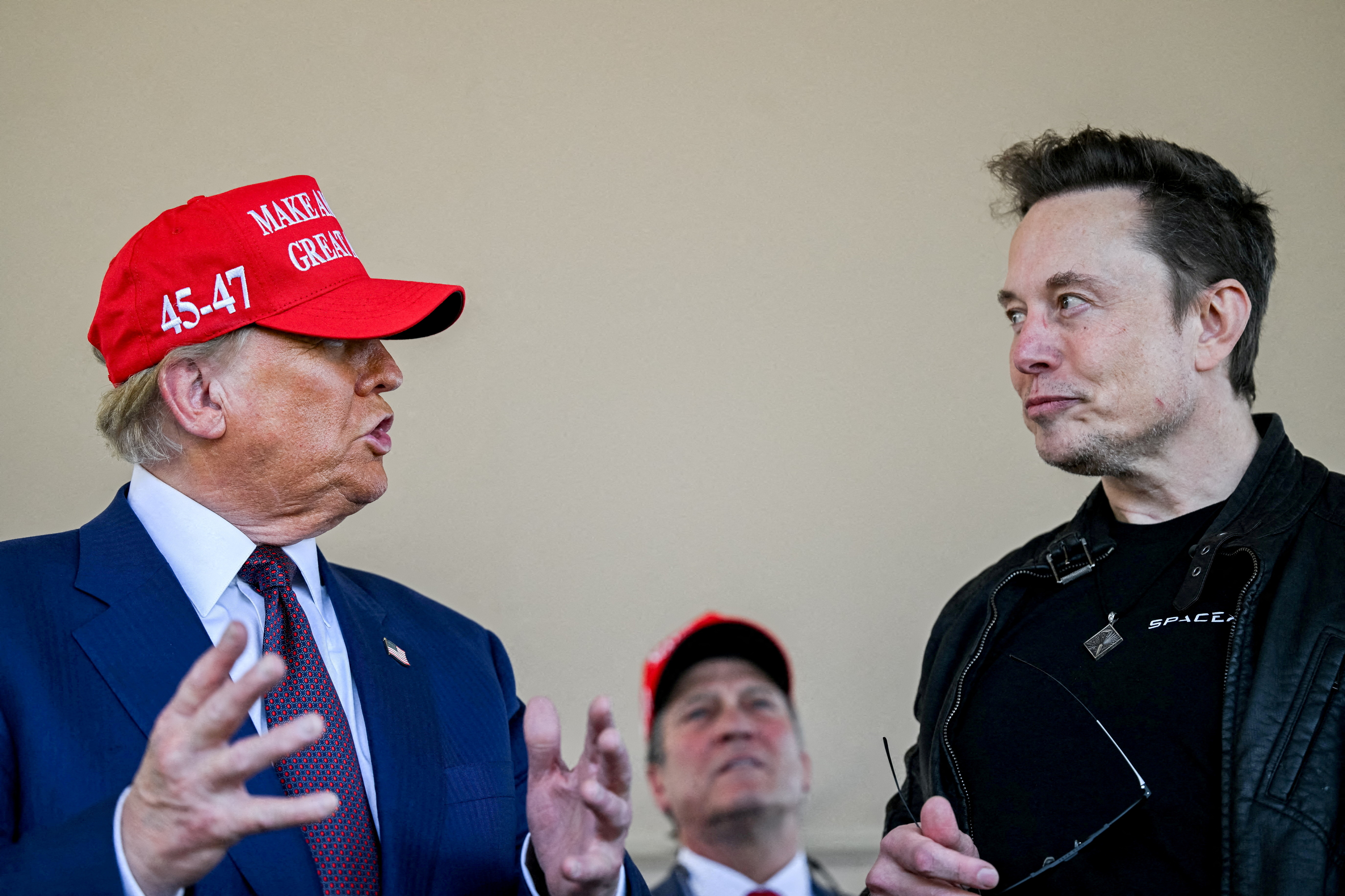 Elon Musk speaks with U.S. President-elect Donald Trump at a viewing of the launch of the sixth test flight of the SpaceX Starship rocket in Brownsville, Texas, U.S., November 19, 2024