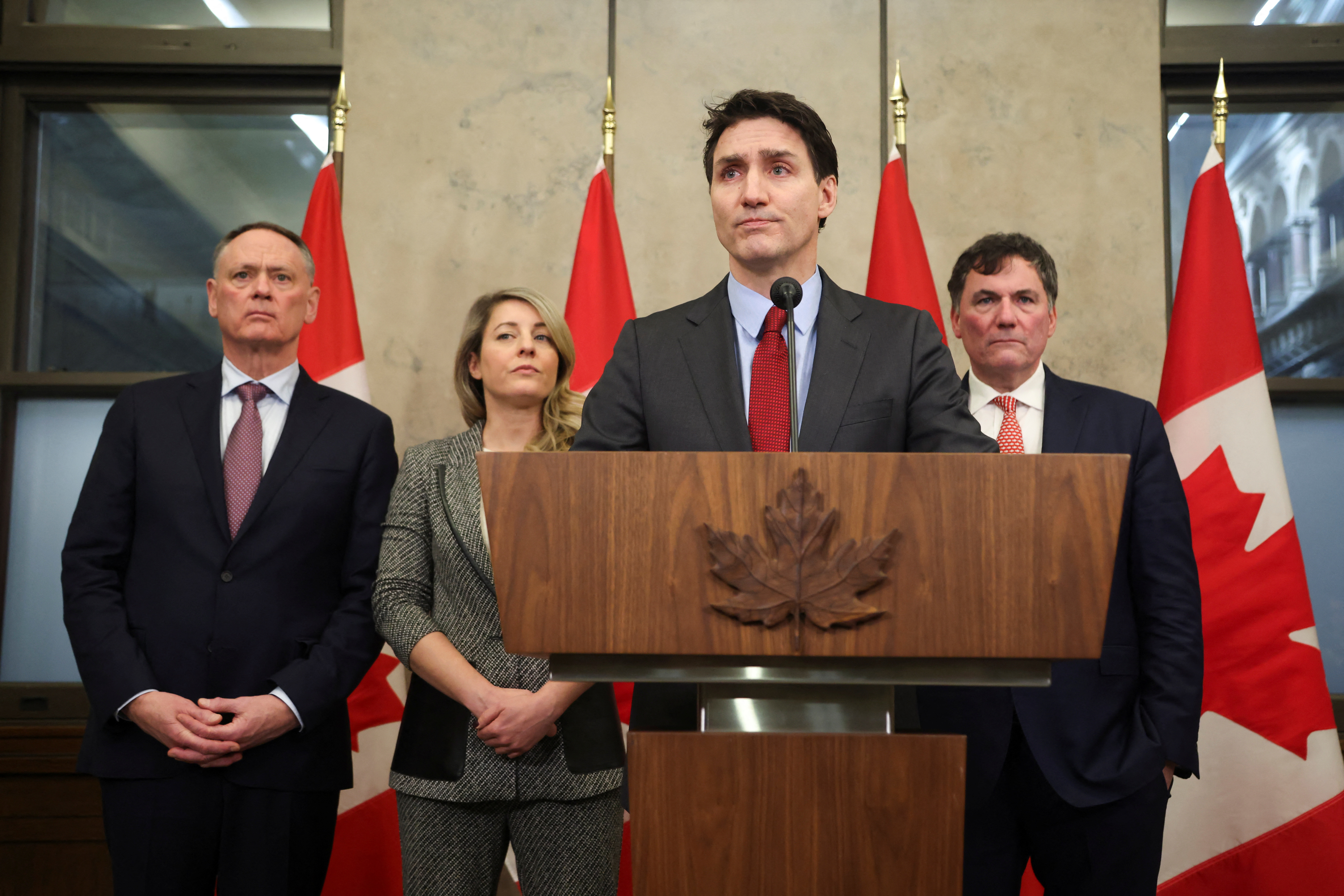 Canada’s Prime Minister Justin Trudeau is joined by Finance Minister Dominic LeBlanc, Minister of Foreign Affairs Melanie Joly, and Minister of Public Safety David McGuinty, as he speaks during a press conference while responding to US President Donald Trump’s orders to impose tariffs on Canadian imports, in Ottawa, Ontario, Canada, on February 1, 2025