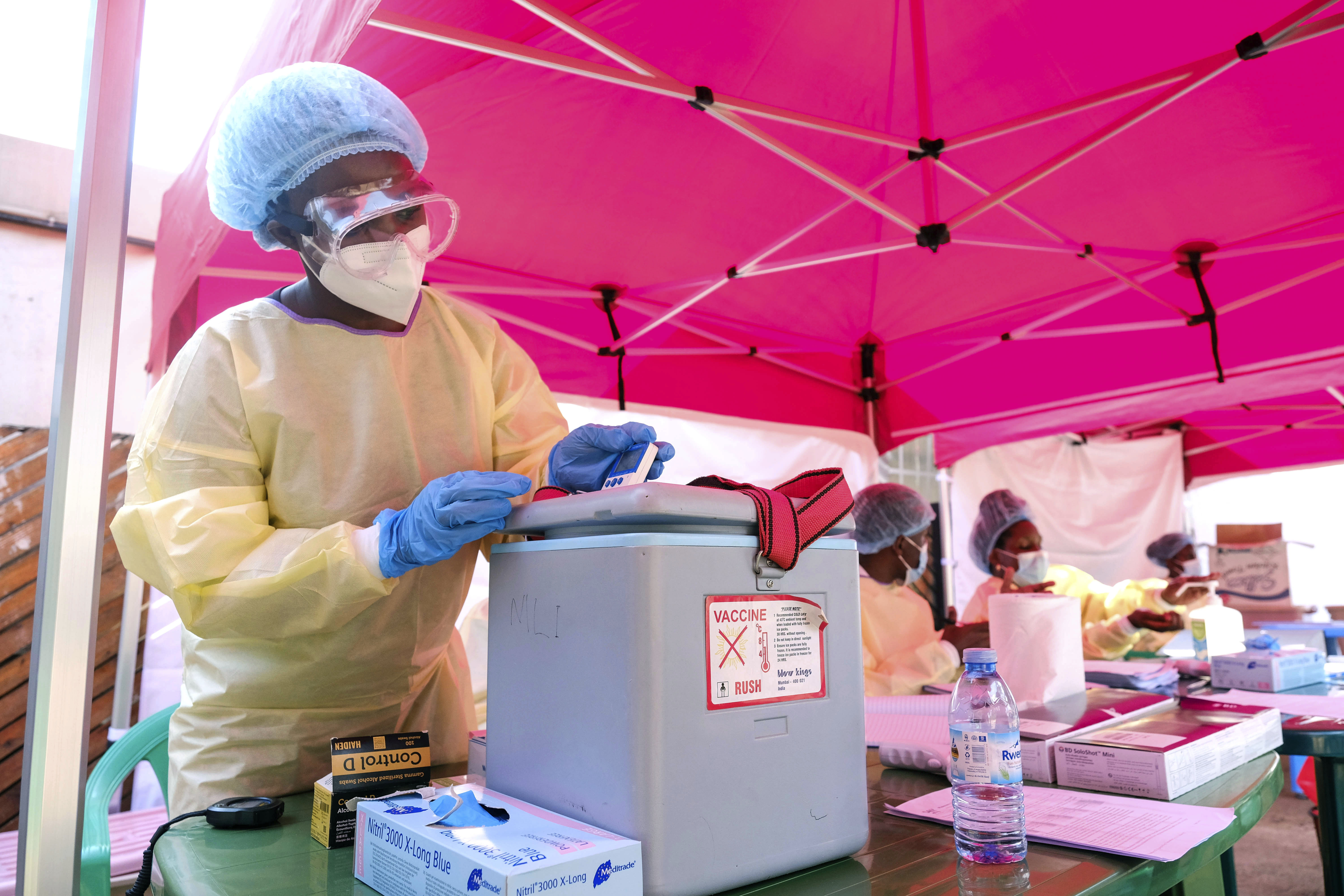 A health worker prepares to administer a vaccine against the Sudan strain of Ebola during a trial, at Mulago Referral Hospital, in Kampala, on February 3, 2025