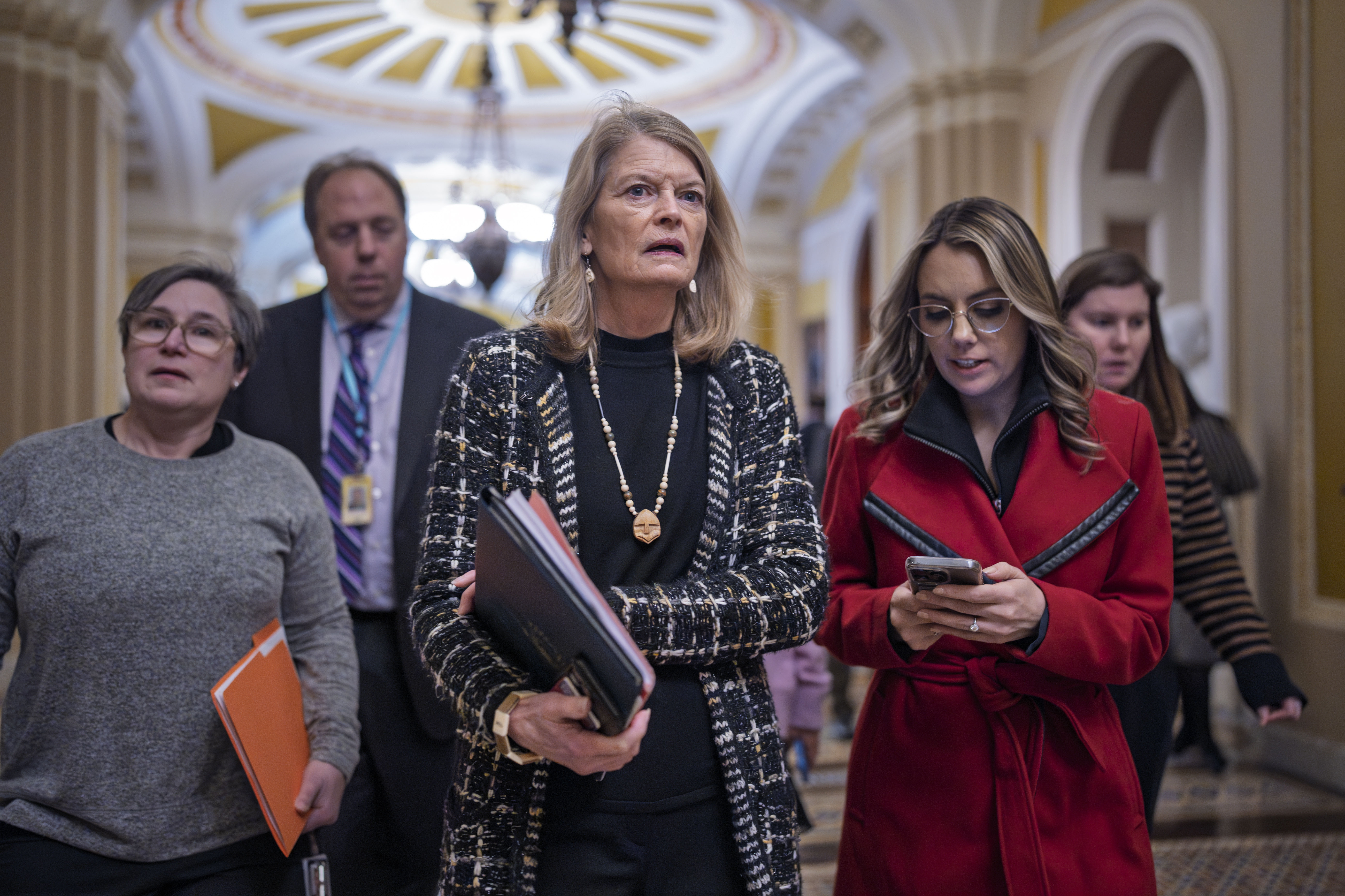 Senator Lisa Murkowski walks to the final vote to confirm Kash Patel on February 20