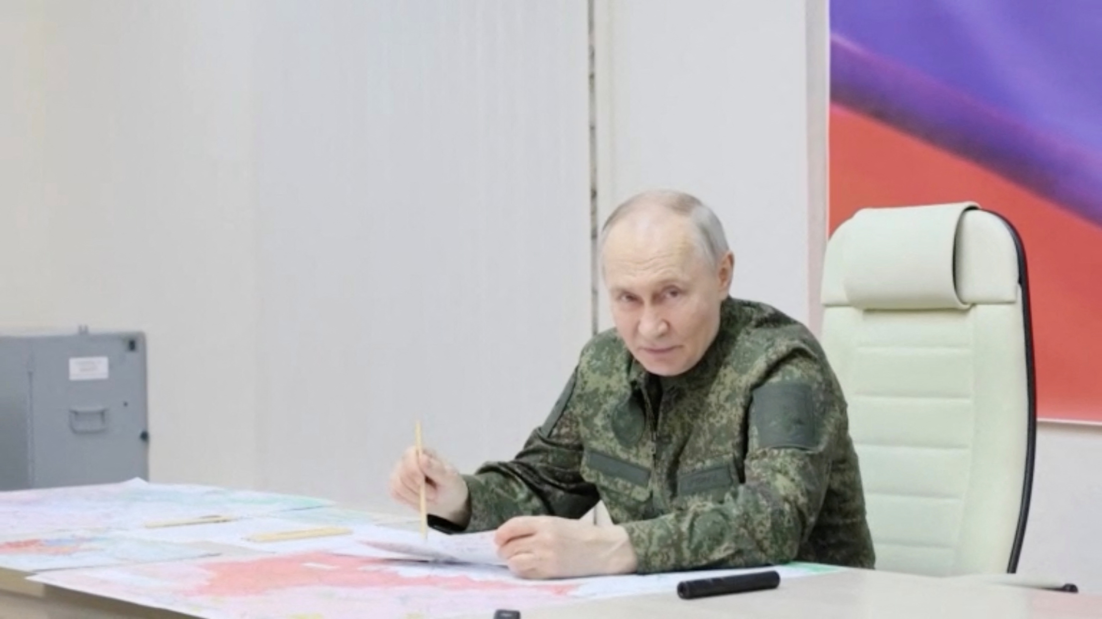 Russia's President Vladimir Putin addresses commanders as he visits a control centre of the Russian armed forces in the course of Russia-Ukraine conflict in the Kursk region, Russia, March 12, 2025, in this still image taken from video. Russian Pool/Reuters TV via REUTERS ATTENTION EDITORS - THIS IMAGE WAS PROVIDED BY A THIRD PARTY.
