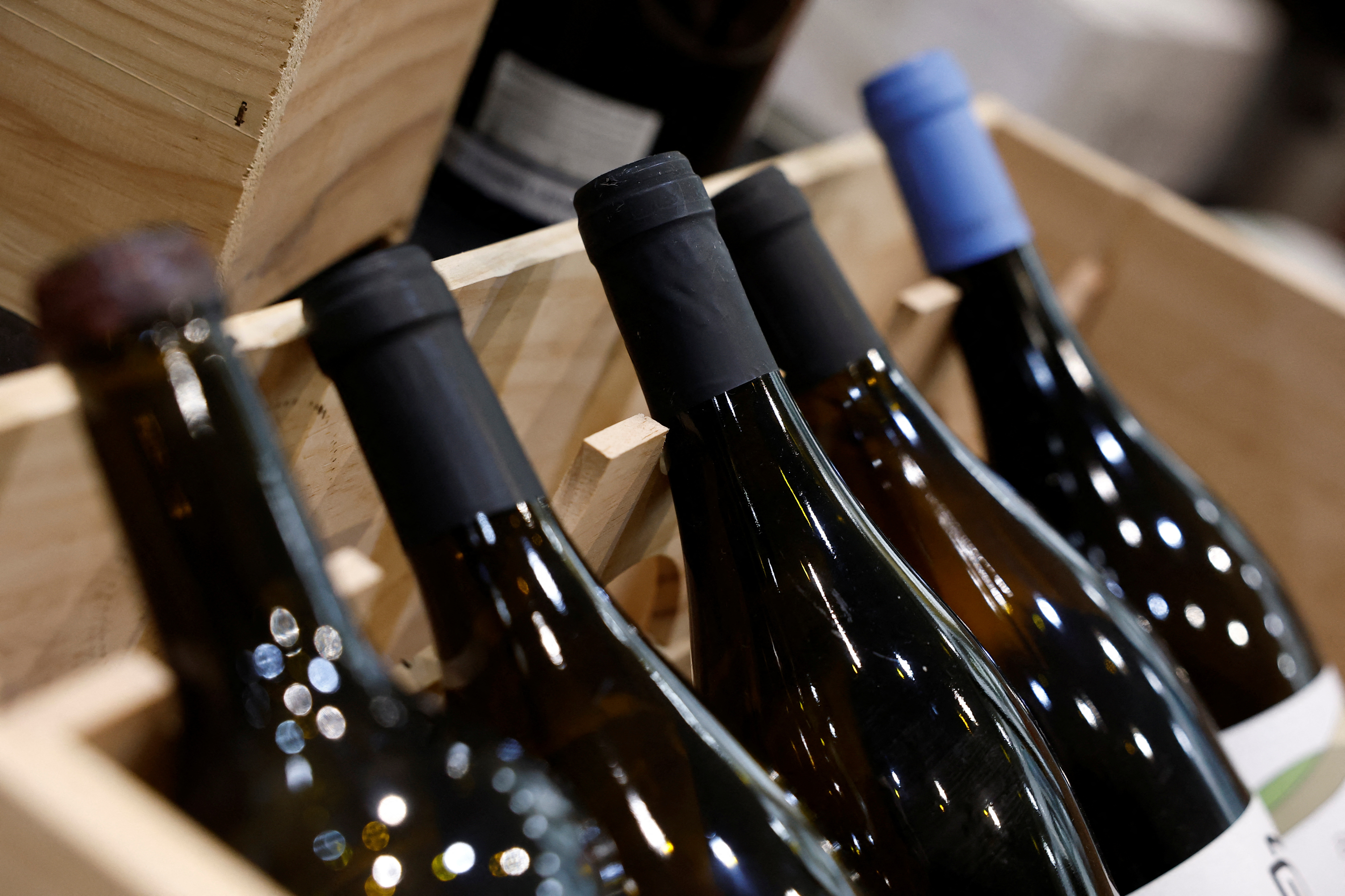 Bottles of wine are seen on display for sale in a wine shop in Paris, France, on March 13, 2025.