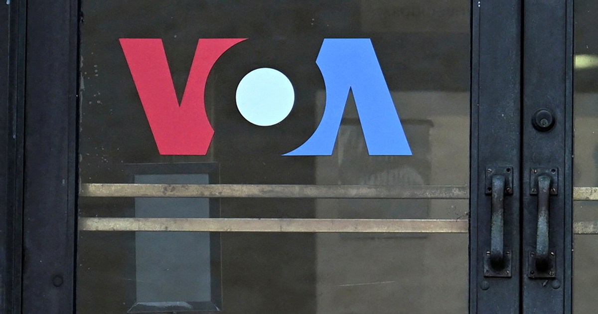 Signage for US broadcaster Voice of America is seen in Washington, DC