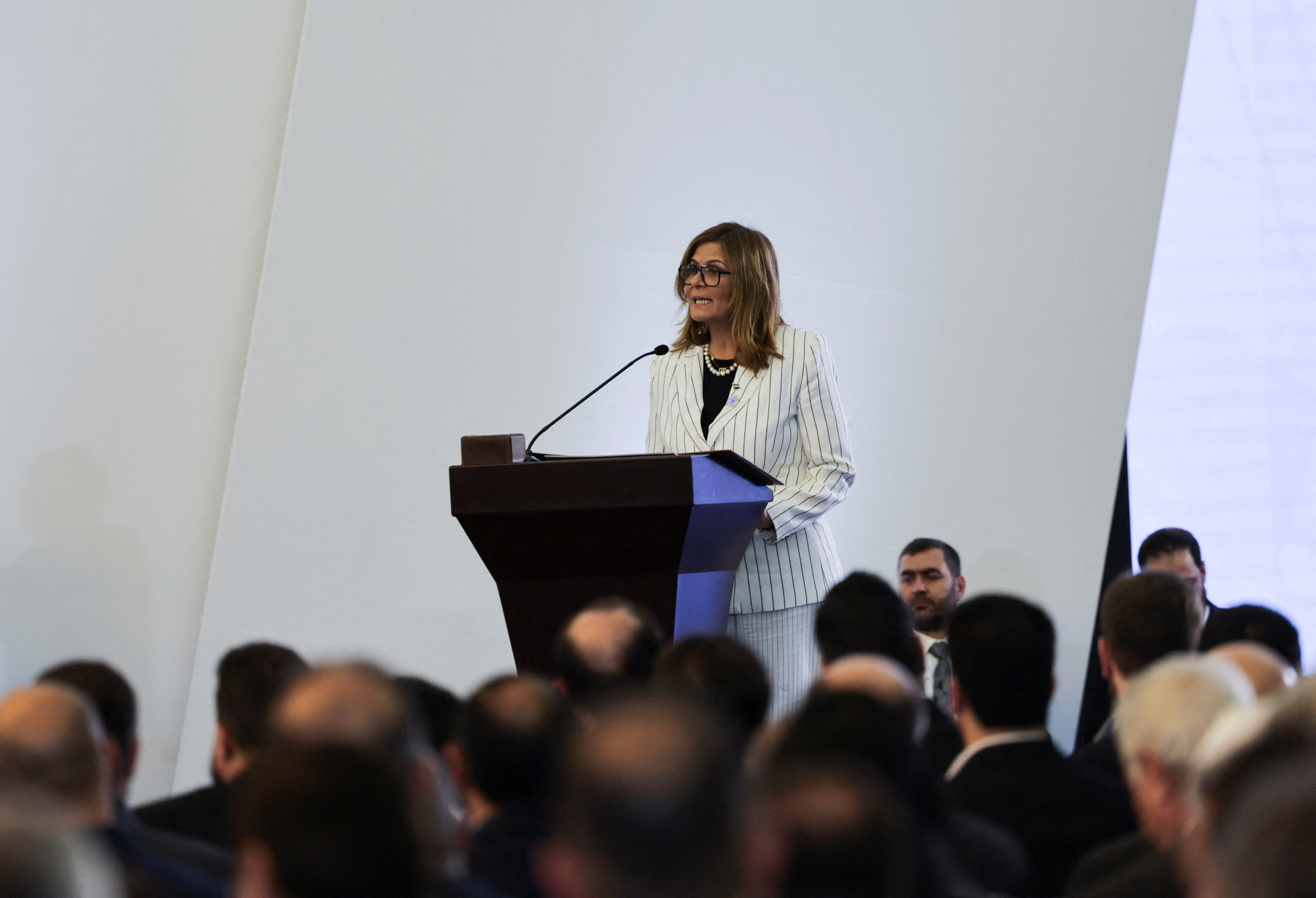 Newly appointed Minister of Social Affairs and Labour Hind Kabawat speaks during the ministerial formation of the government in Damascus, Syria, March 29, 2025