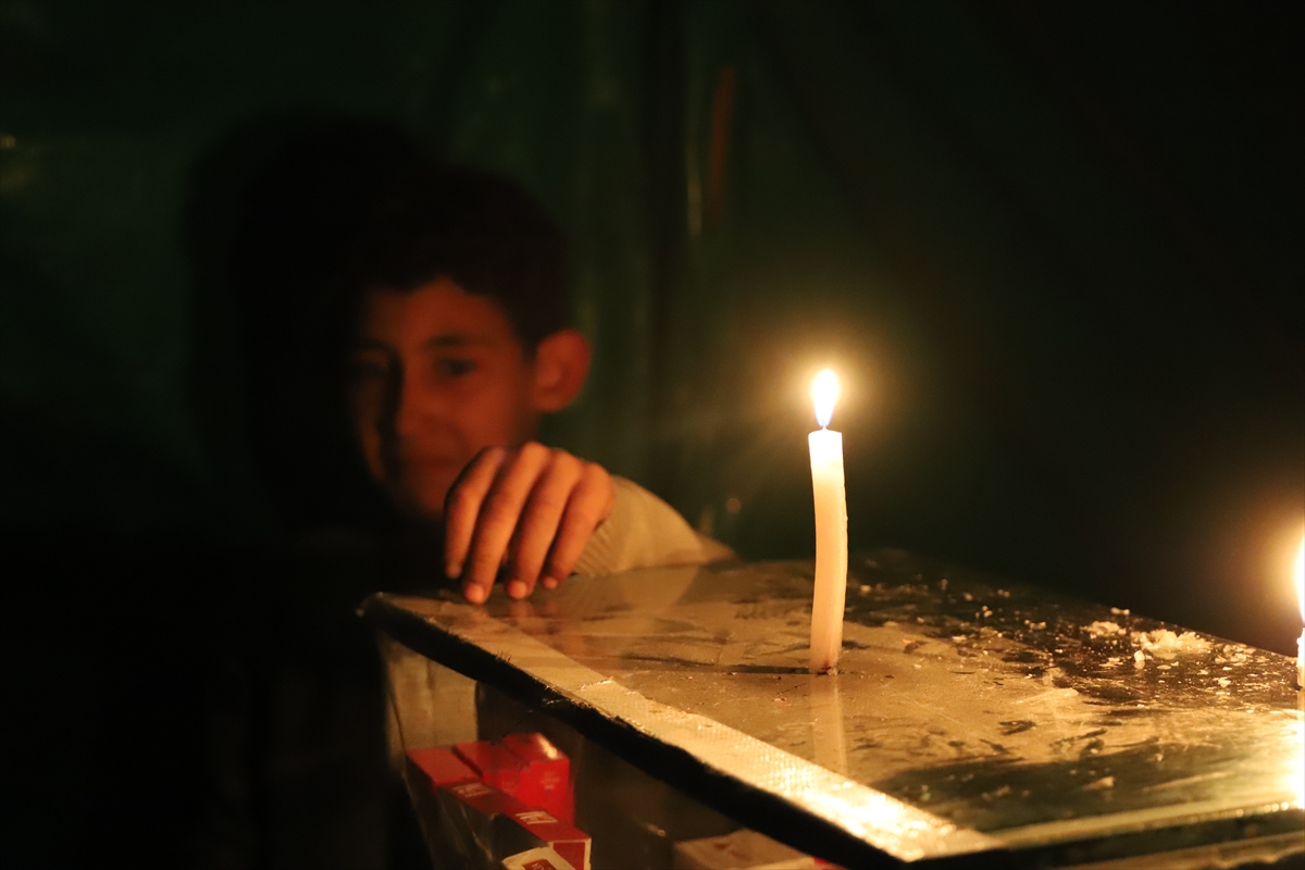 a child with a candle