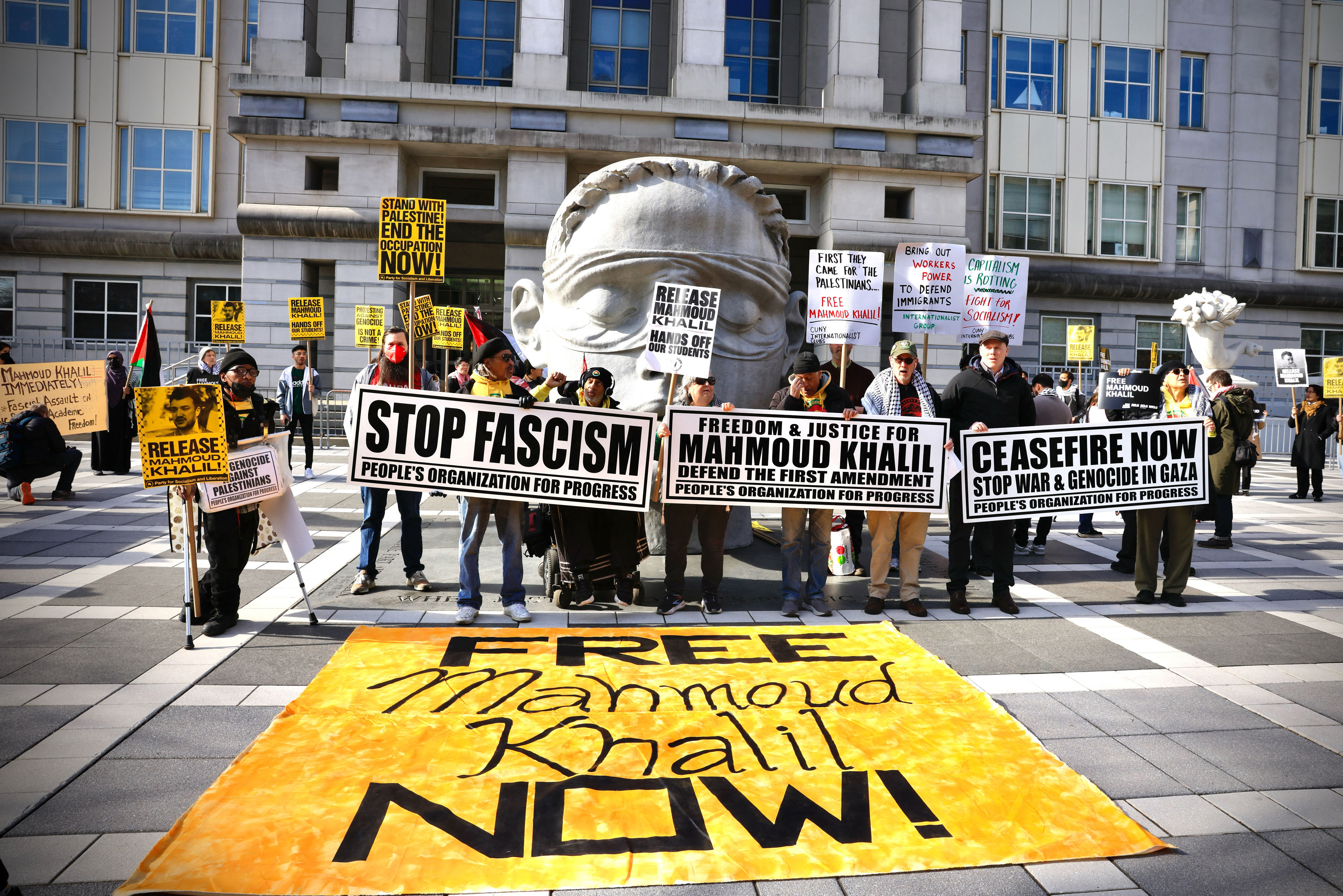 Protesters outside of a courtroom