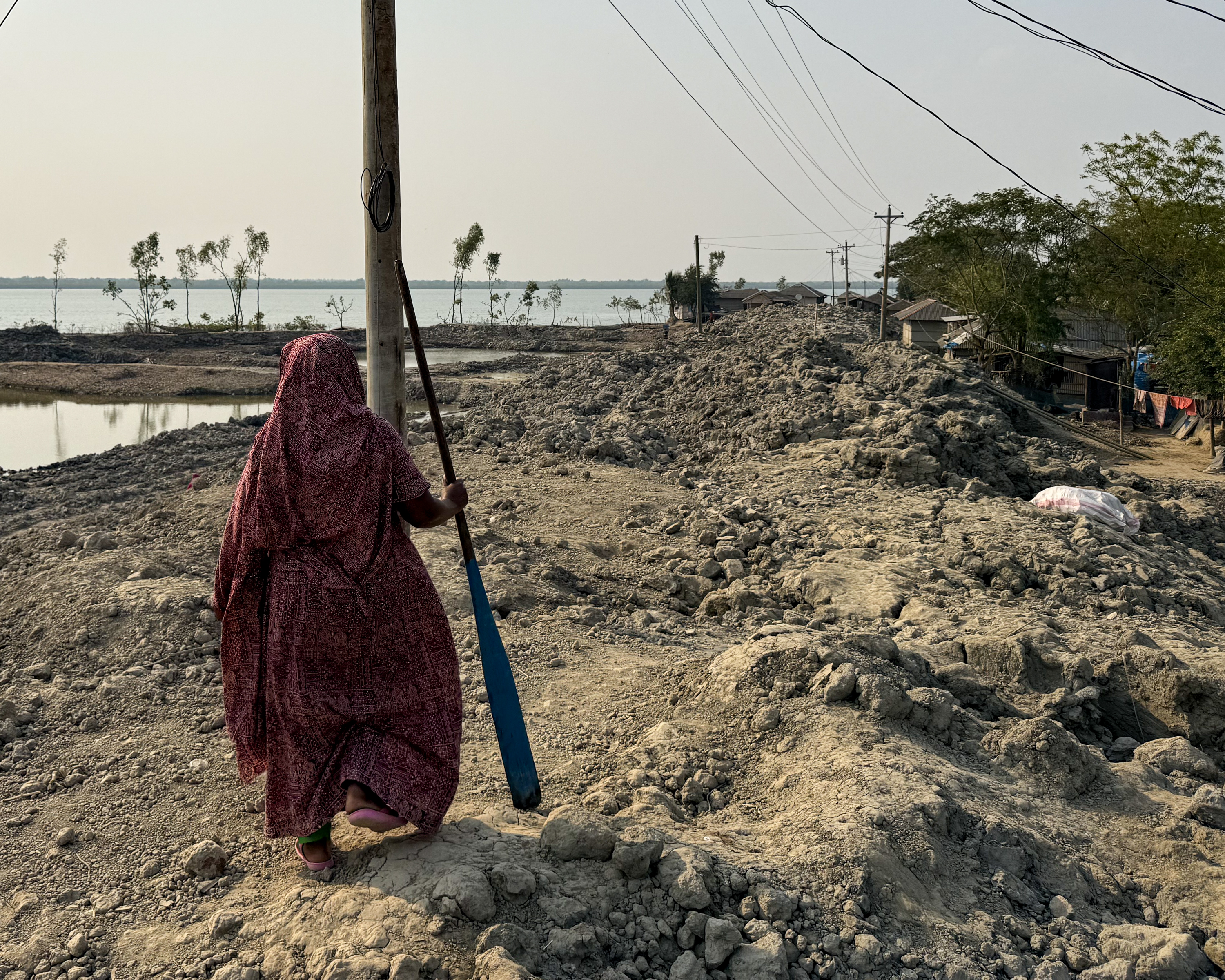 The fisherwoman of the Sundarbans - Mahfuza [Rubayet Mahmood/Al Jazeera]